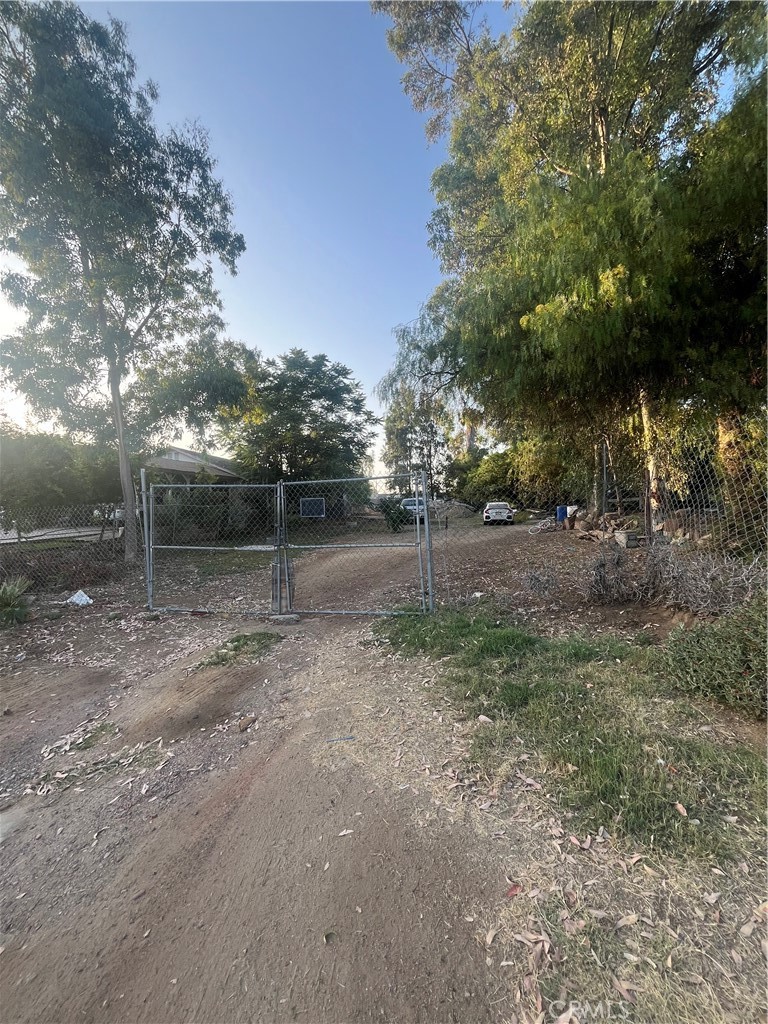 21580 Lane Street Perris, CA 92570 - Photo 2 of 6 a view of a yard with trees