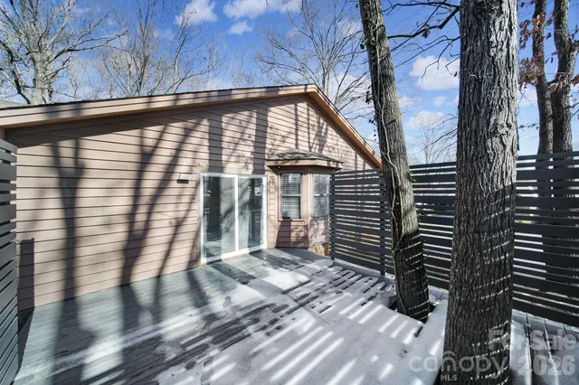 a view of backyard with a small cabin
