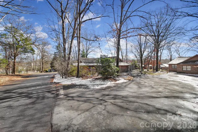 a view of road with trees