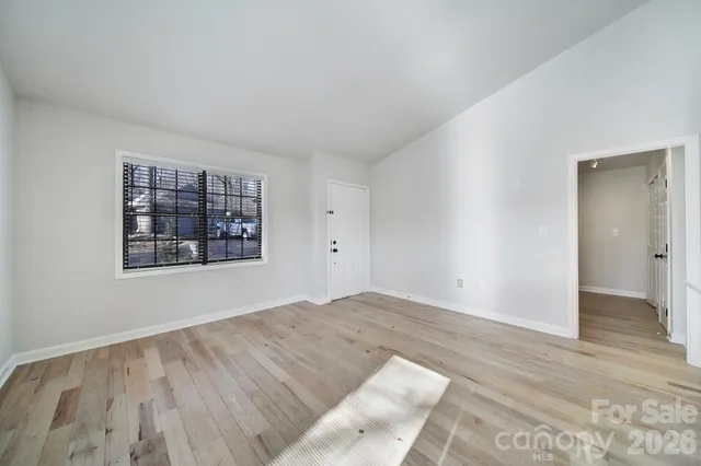 a view of an empty room and window