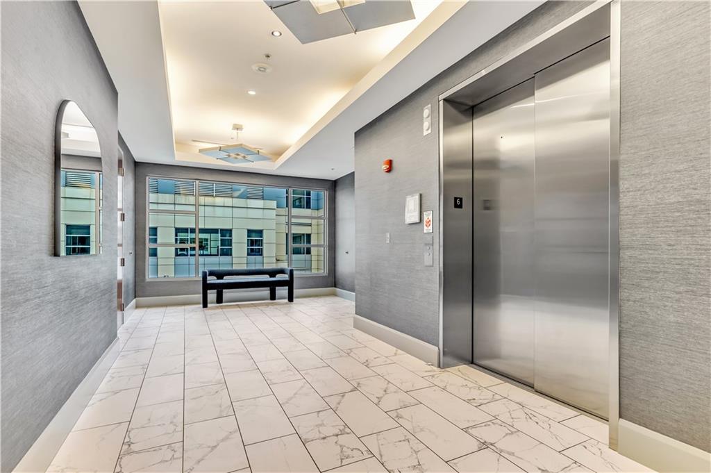 301 Fifth Avenue, Unit 511 Pittsburgh, PA 15222 - Photo 27 of 33 a view of empty room with wooden floor and fan