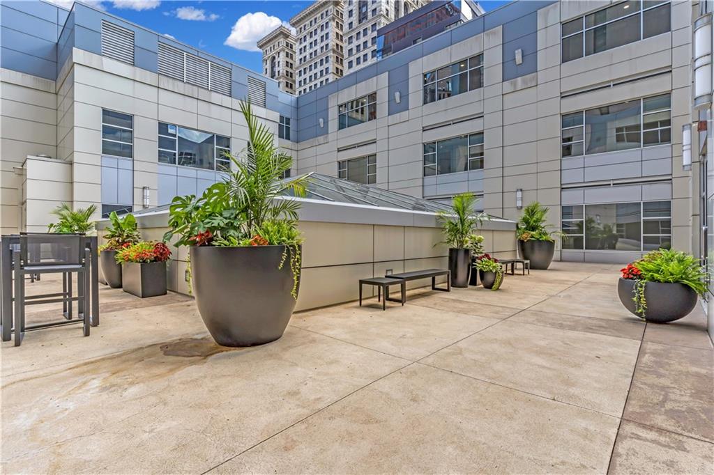 301 Fifth Avenue, Unit 511 Pittsburgh, PA 15222 - Photo 33 of 33 a view of a patio with plants and chairs