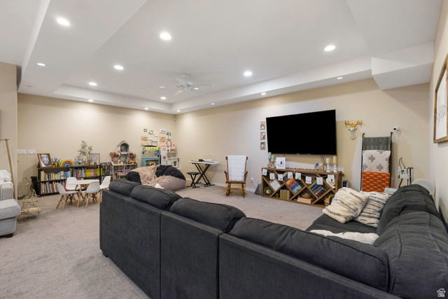 684 North Summit Way Alpine, UT 84004 - Photo 54 of 58 Living room with light carpet, a ceiling fan, recessed lighting, and a raised ceiling