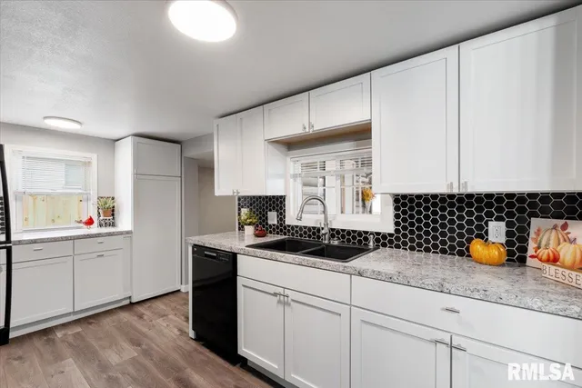 a kitchen with a stove and a microwave