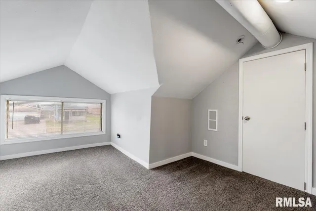 a view of a hallway with closet