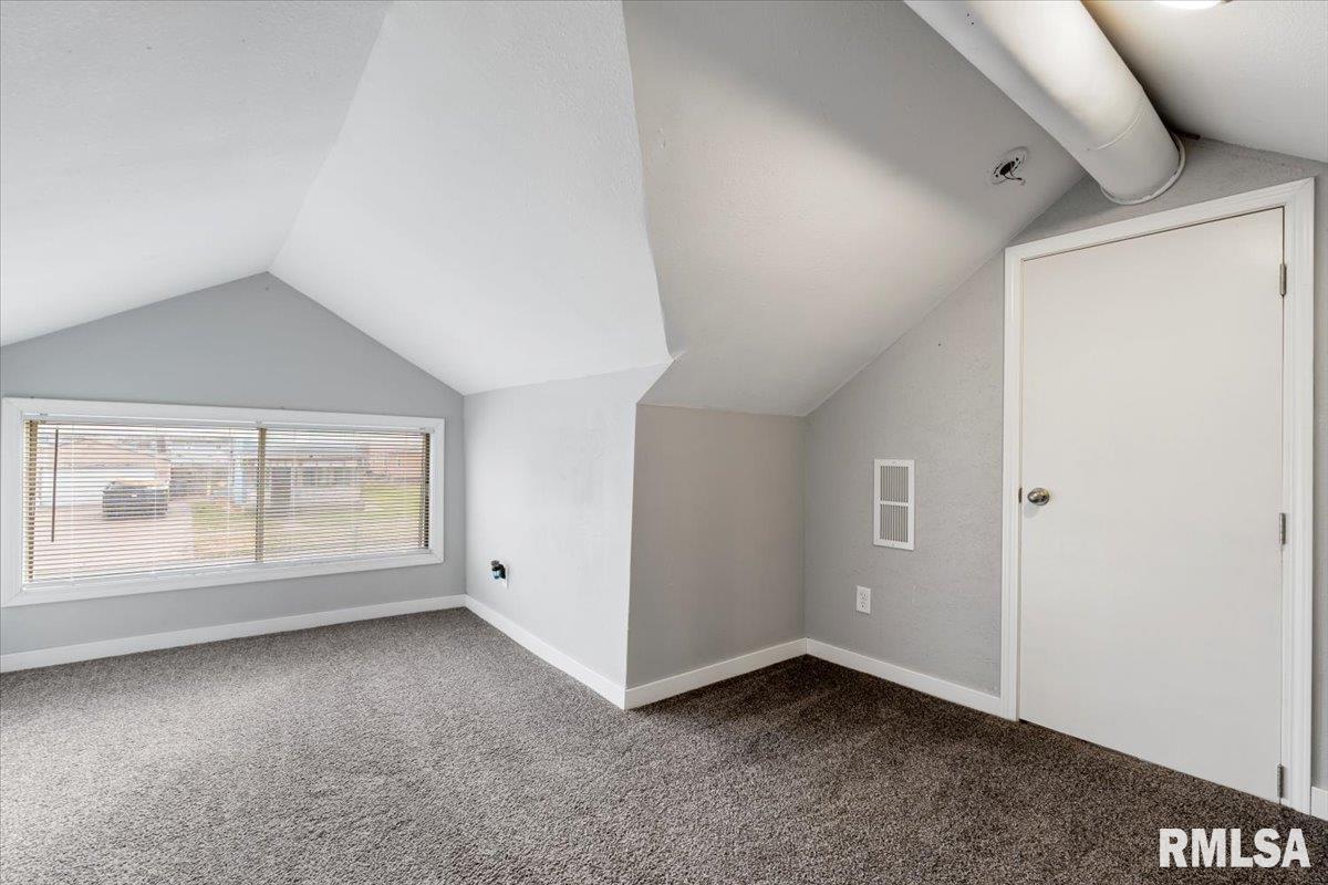 321 2nd Avenue East Milan, IL 61264 - Photo 23 of 33 an empty room with a empty space and windows