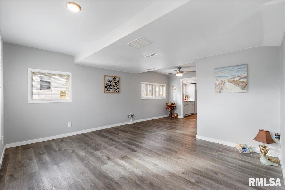 321 2nd Avenue East Milan, IL 61264 - Photo 8 of 33 a view of empty room with wooden floor