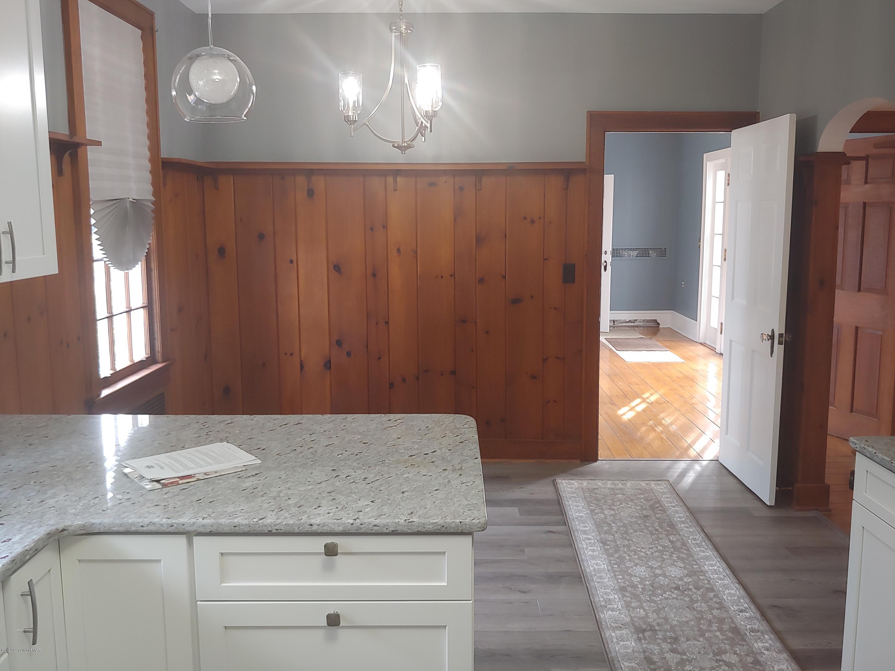 476 Laurel Pine Road Cresco, PA 18326 - Photo 18 of 45 a bathroom with a granite countertop sink and a mirror