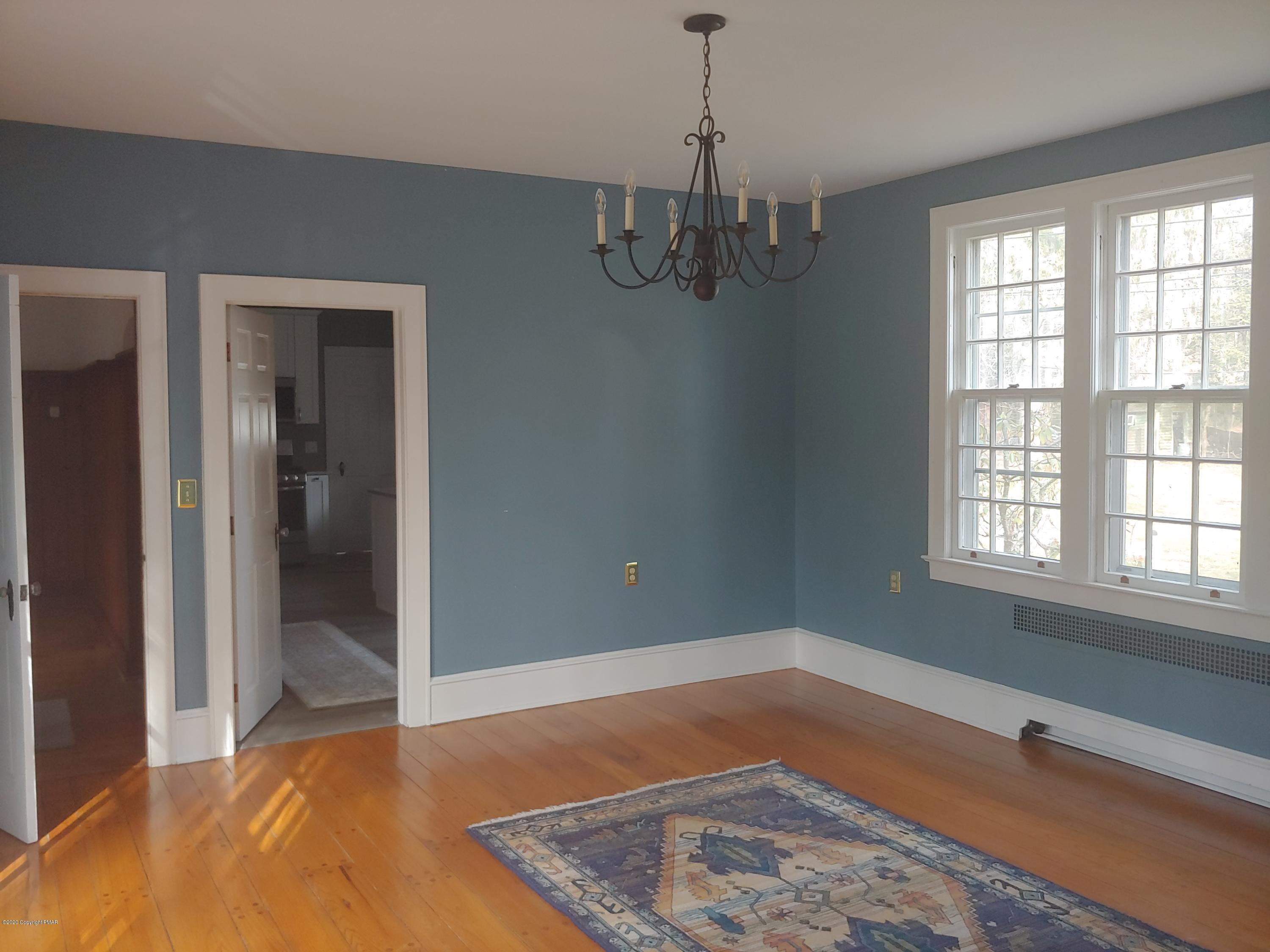 476 Laurel Pine Road Cresco, PA 18326 - Photo 10 of 45 a view of a livingroom with a ceiling fan and window