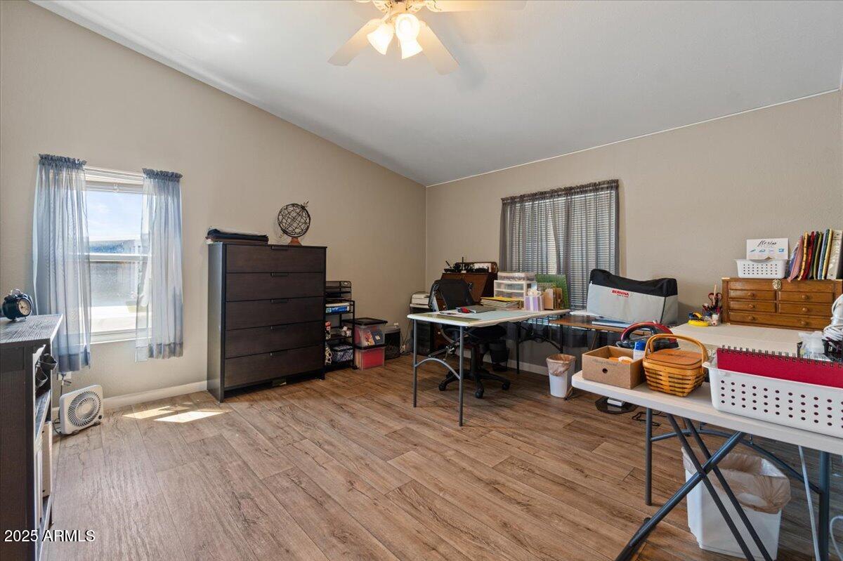 834 South Meridian Road, Unit 54 Apache Junction, AZ 85120 - Photo 30 of 56 a livingroom with workspace and a window