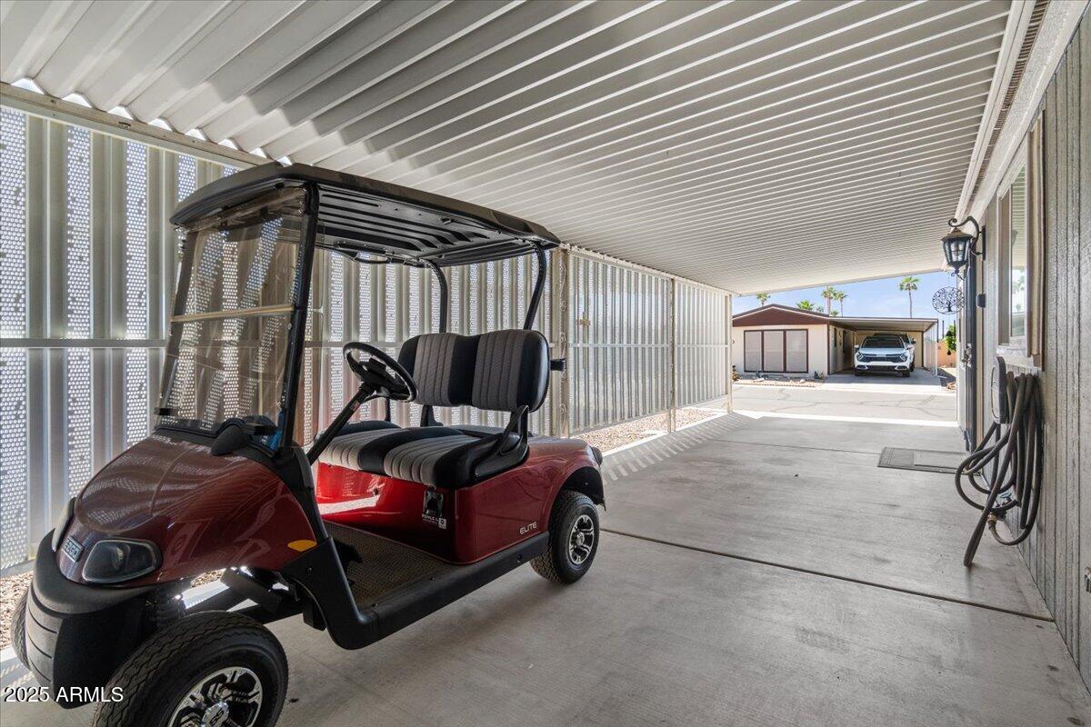 834 South Meridian Road, Unit 54 Apache Junction, AZ 85120 - Photo 35 of 56 a car parked in a garage