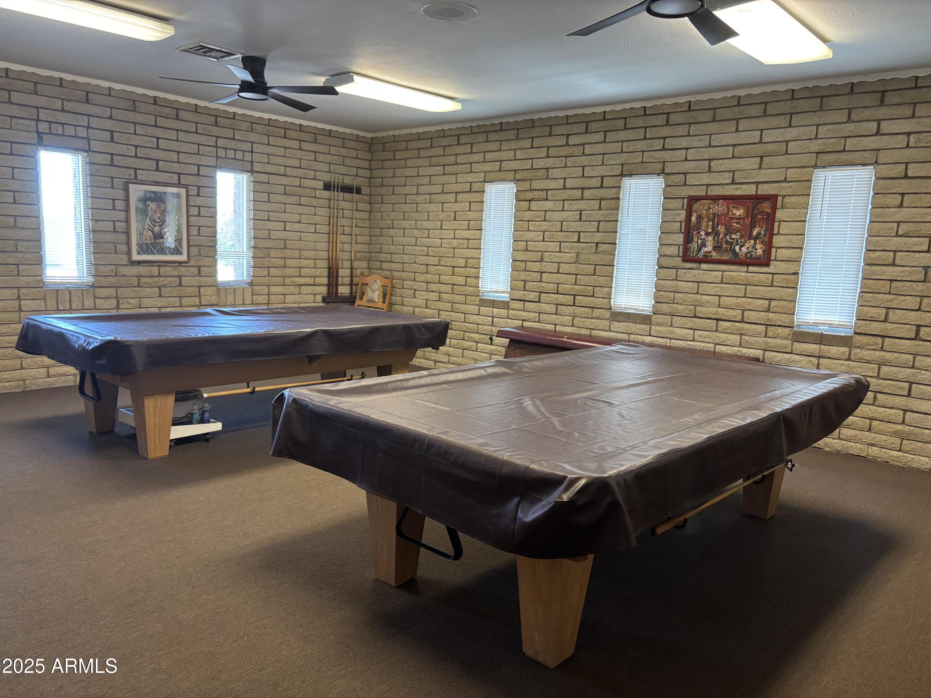 834 South Meridian Road, Unit 54 Apache Junction, AZ 85120 - Photo 42 of 56 a room with pool table and windows