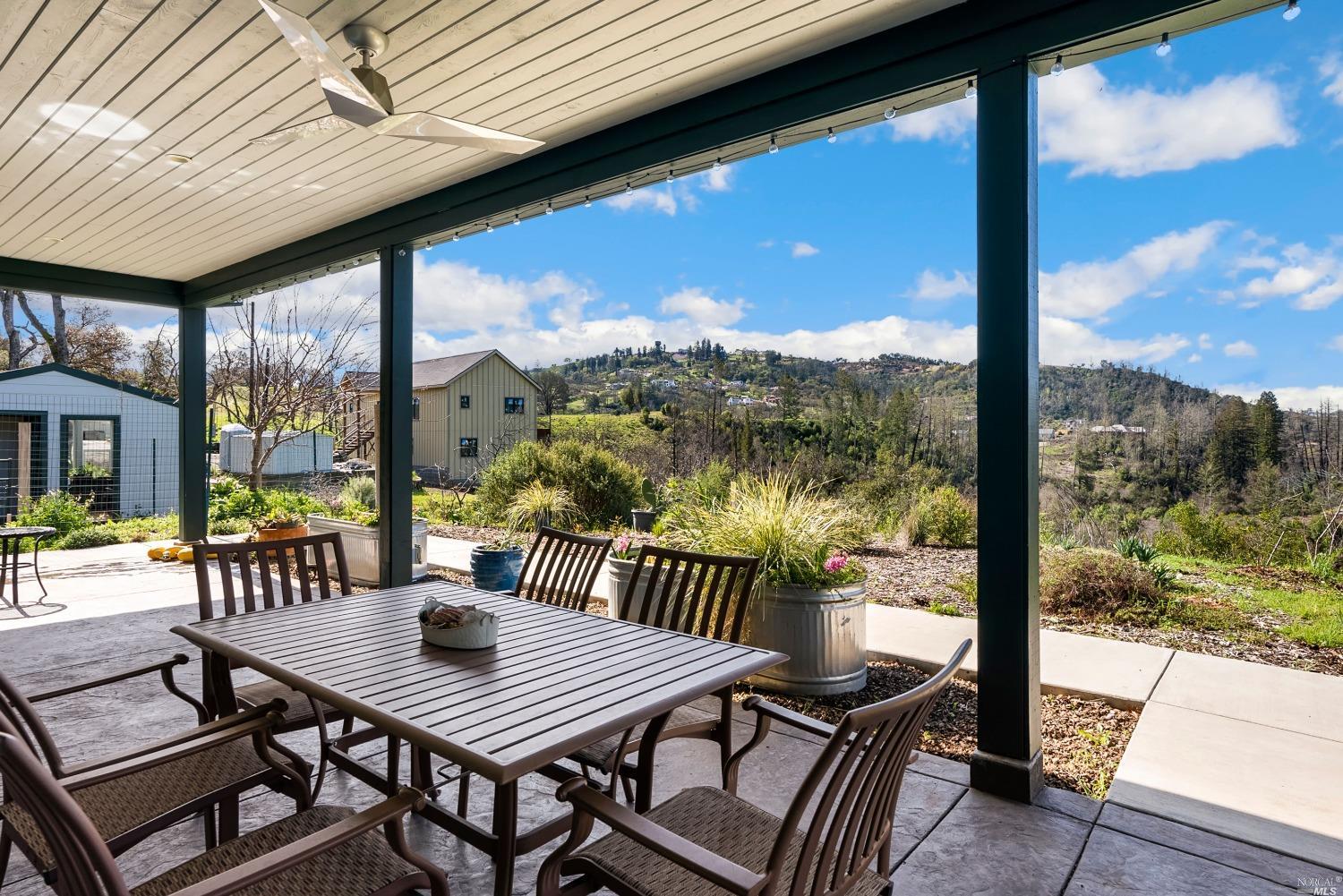 1288 Michele Way Santa Rosa, CA 95404 - Photo 1 of 1 a view of a patio with a table chairs and a porch
