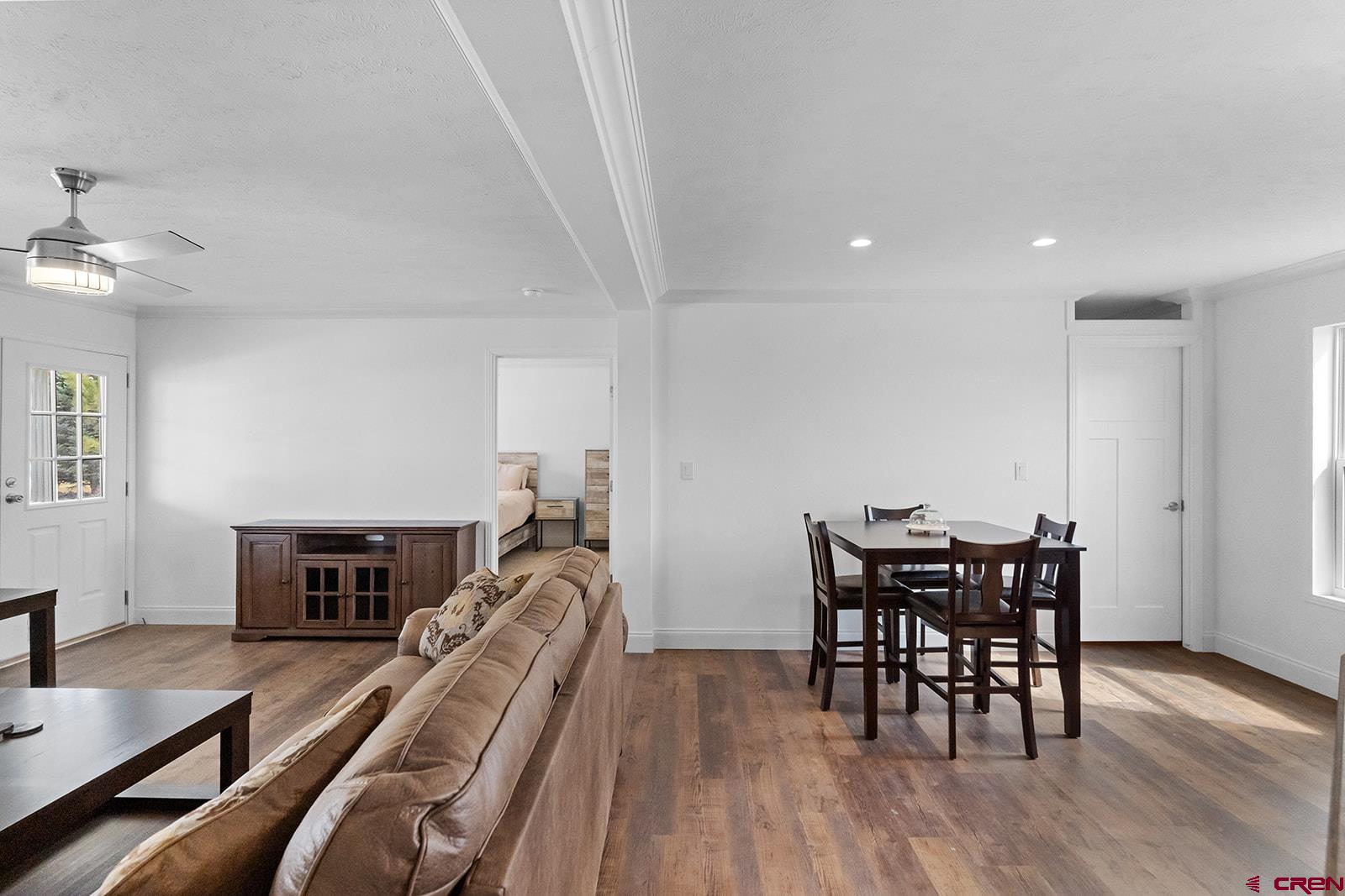 901 6530 Road, Unit 1504 Montrose, CO 81401 - Photo 14 of 25 a view of a dining room with furniture and wooden floor