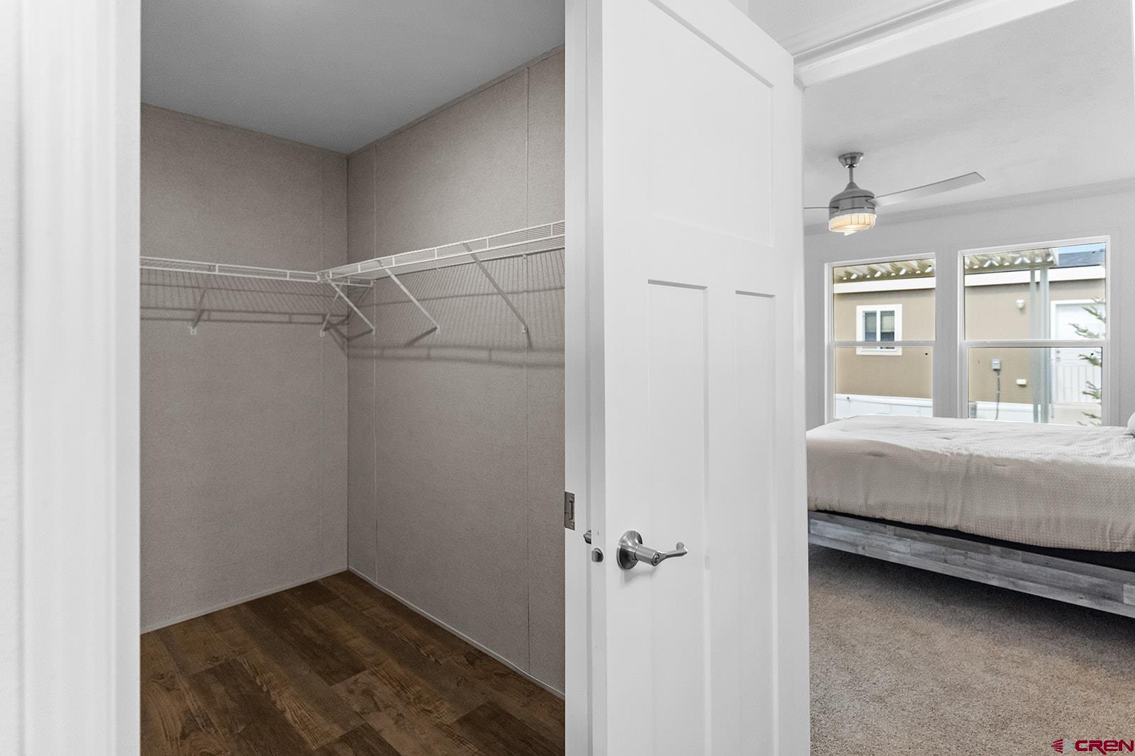 901 6530 Road, Unit 1504 Montrose, CO 81401 - Photo 20 of 25 a bedroom with a bed and a window