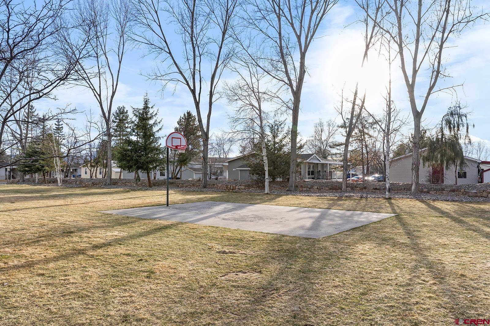 901 6530 Road, Unit 1504 Montrose, CO 81401 - Photo 22 of 25 a view of a yard with trees