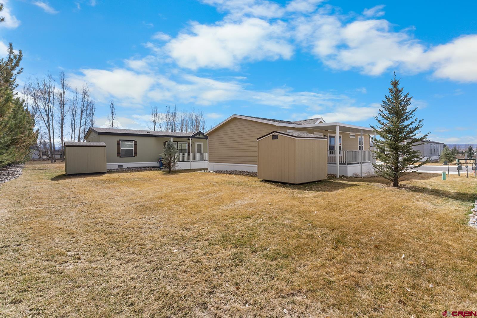 901 6530 Road, Unit 1504 Montrose, CO 81401 - Photo 5 of 25 a view of a house with a snow
