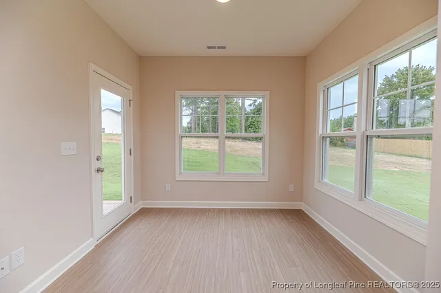 an empty room with windows