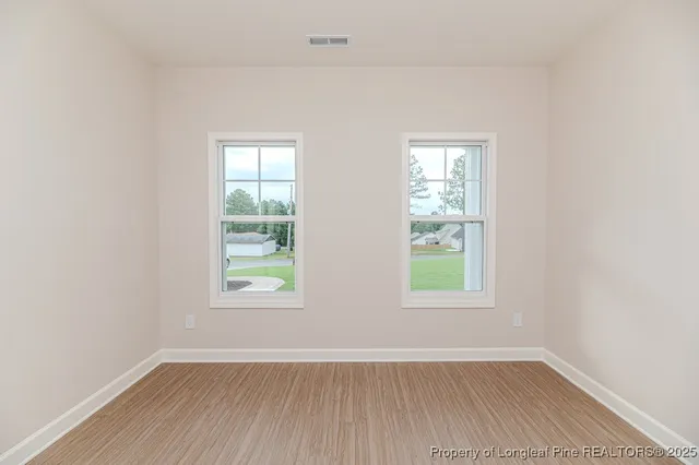 an empty room with window