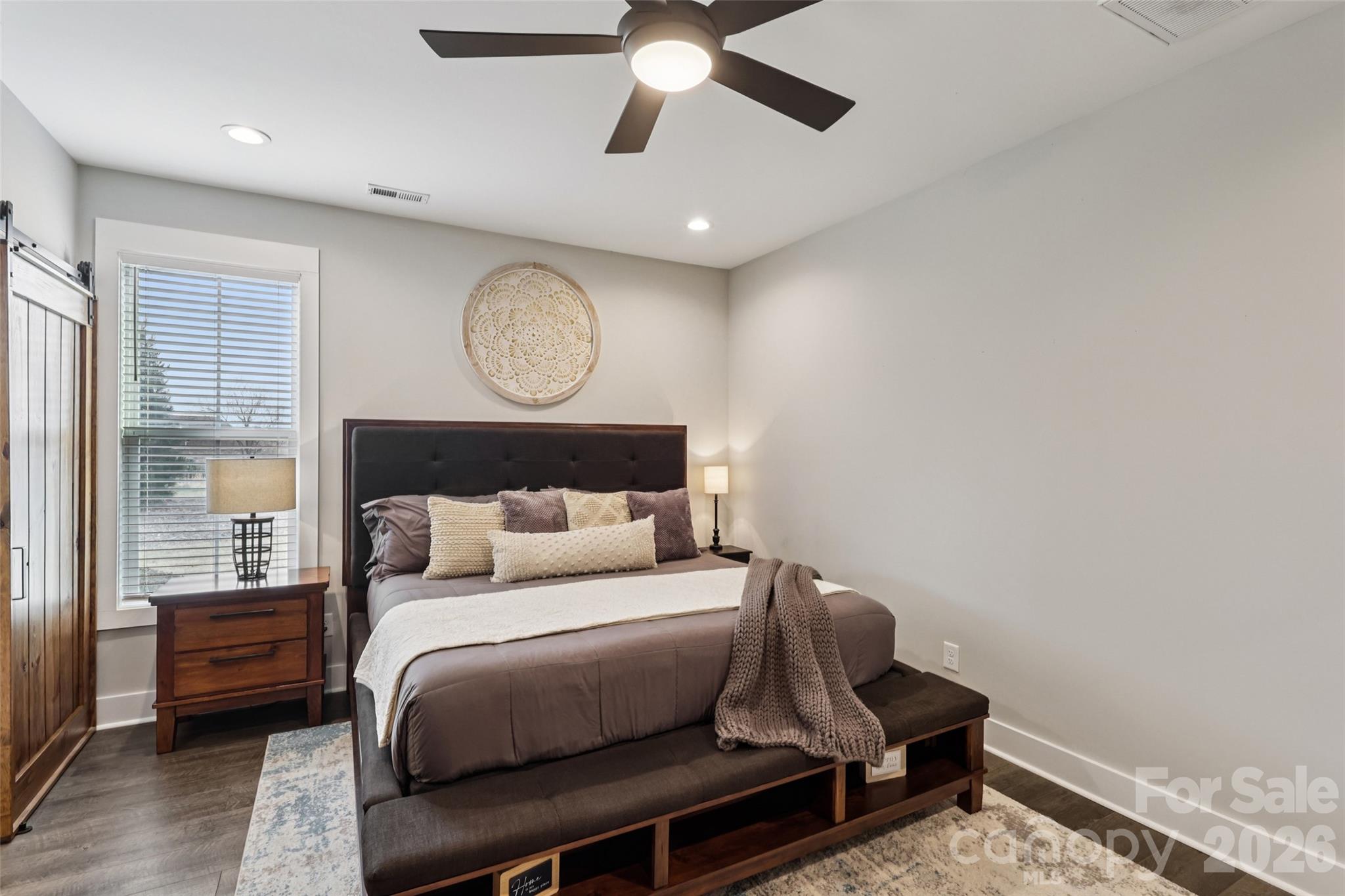 2807 Noritake Trail Albemarle, NC 28001 - Photo 25 of 45 a bed room with a bed mirror and a window
