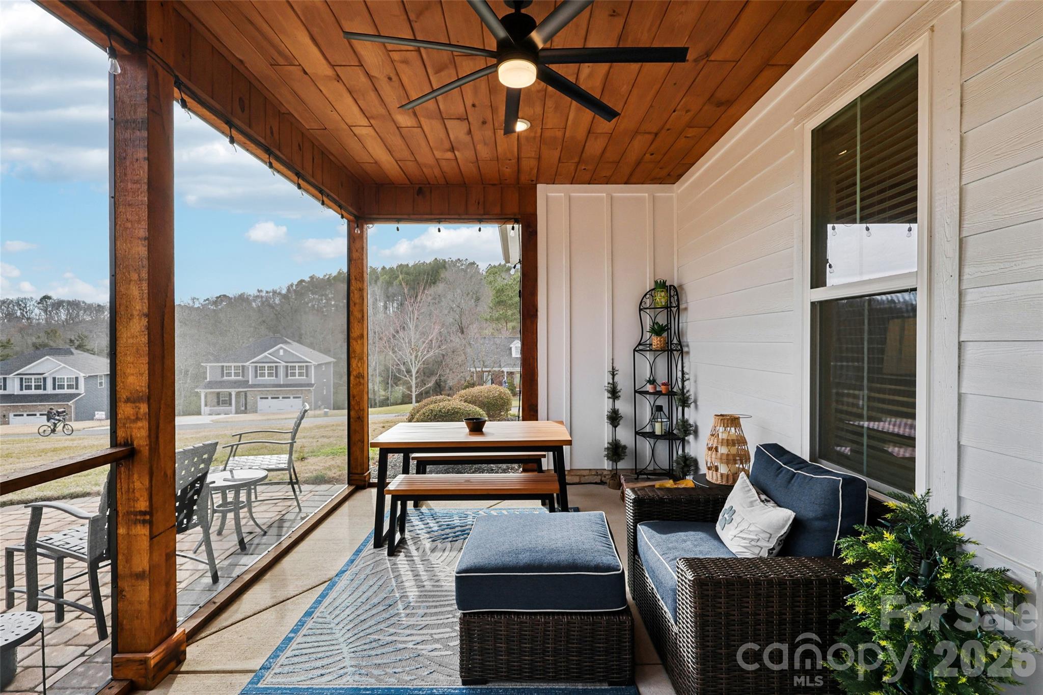 2807 Noritake Trail Albemarle, NC 28001 - Photo 40 of 45 a living room with furniture and a floor to ceiling window
