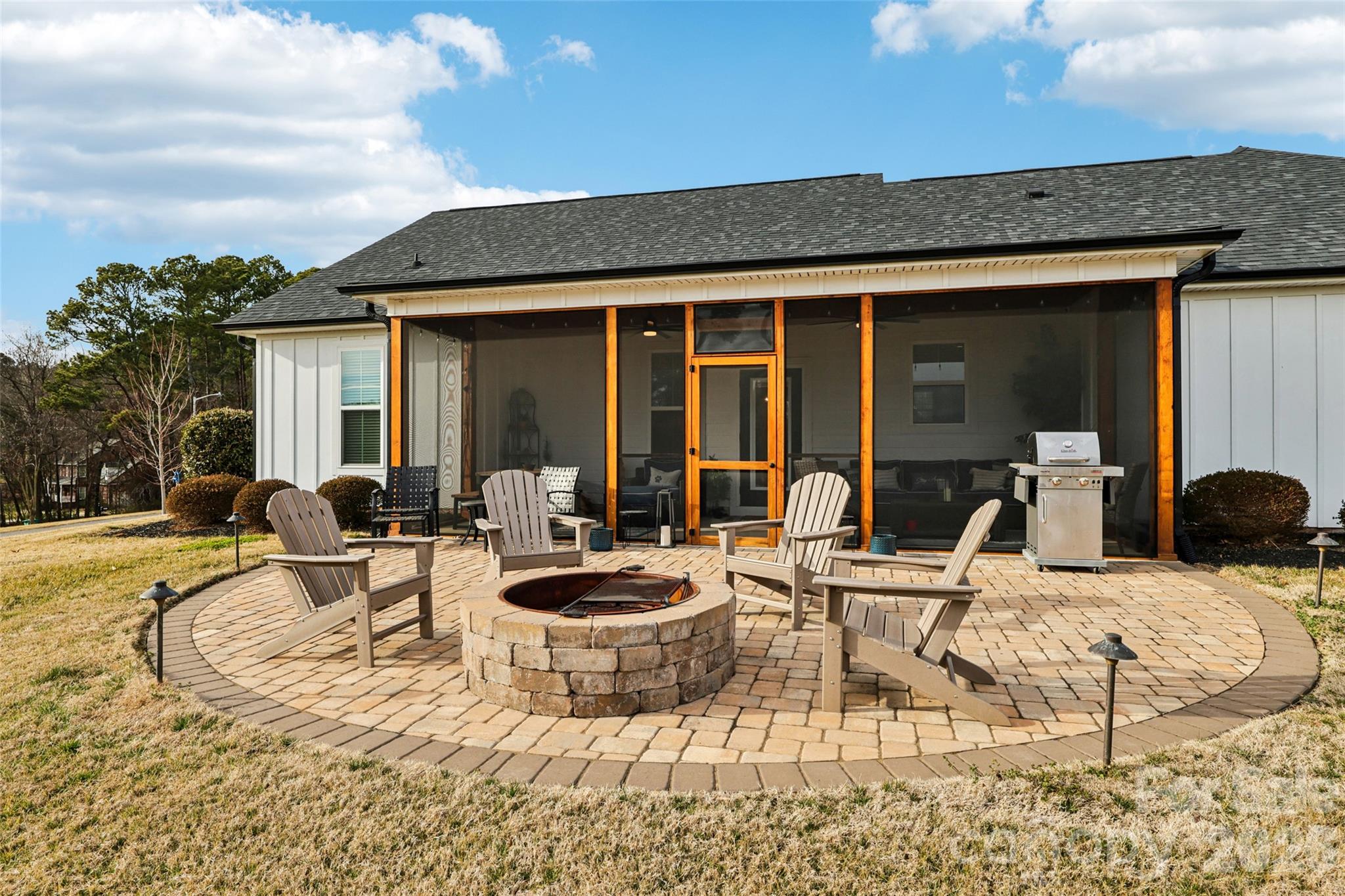 2807 Noritake Trail Albemarle, NC 28001 - Photo 4 of 45 a view of a house with backyard outdoor seating and patio