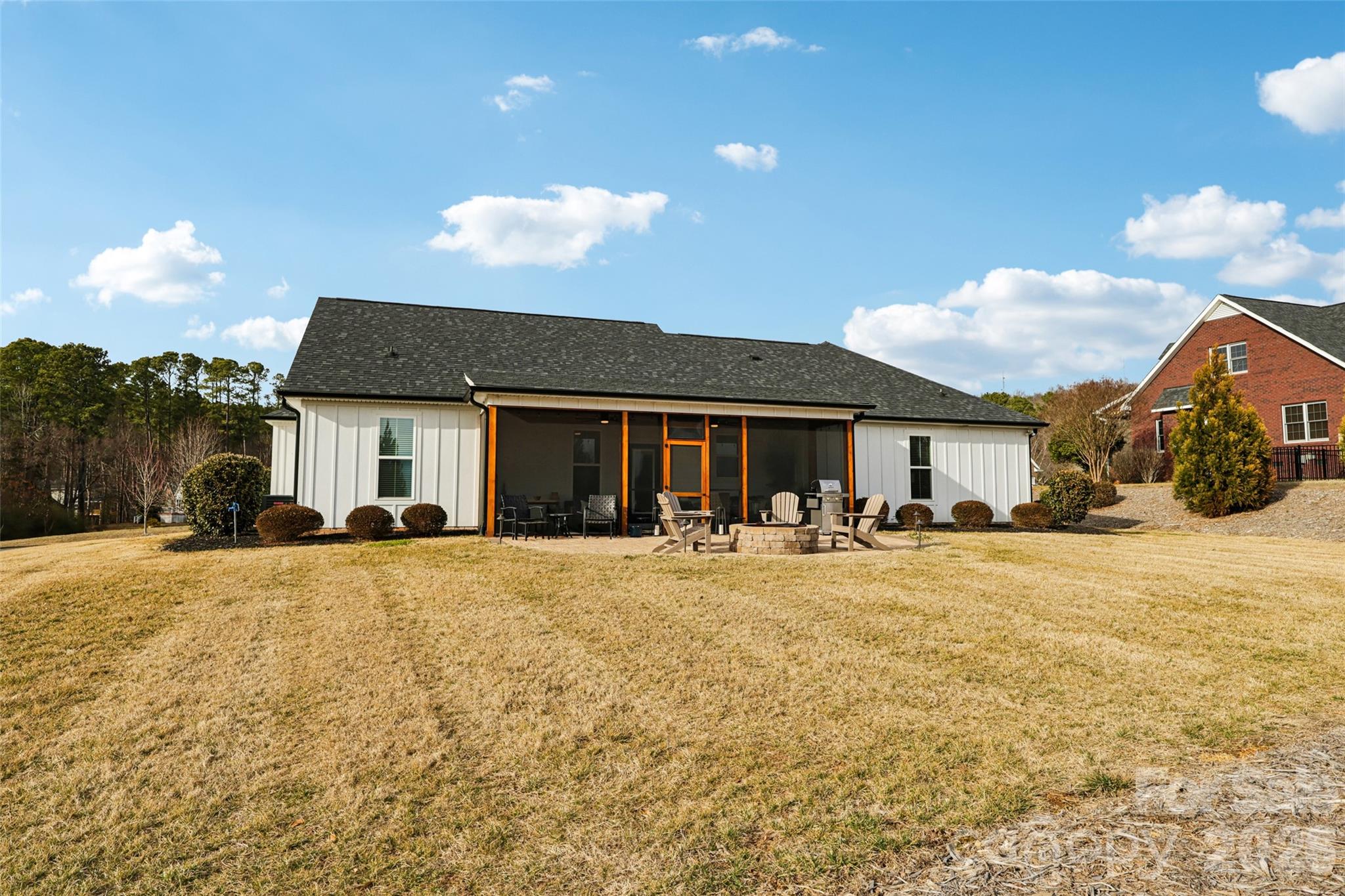 2807 Noritake Trail Albemarle, NC 28001 - Photo 44 of 45 a front view of a house with yard patio and fire pit