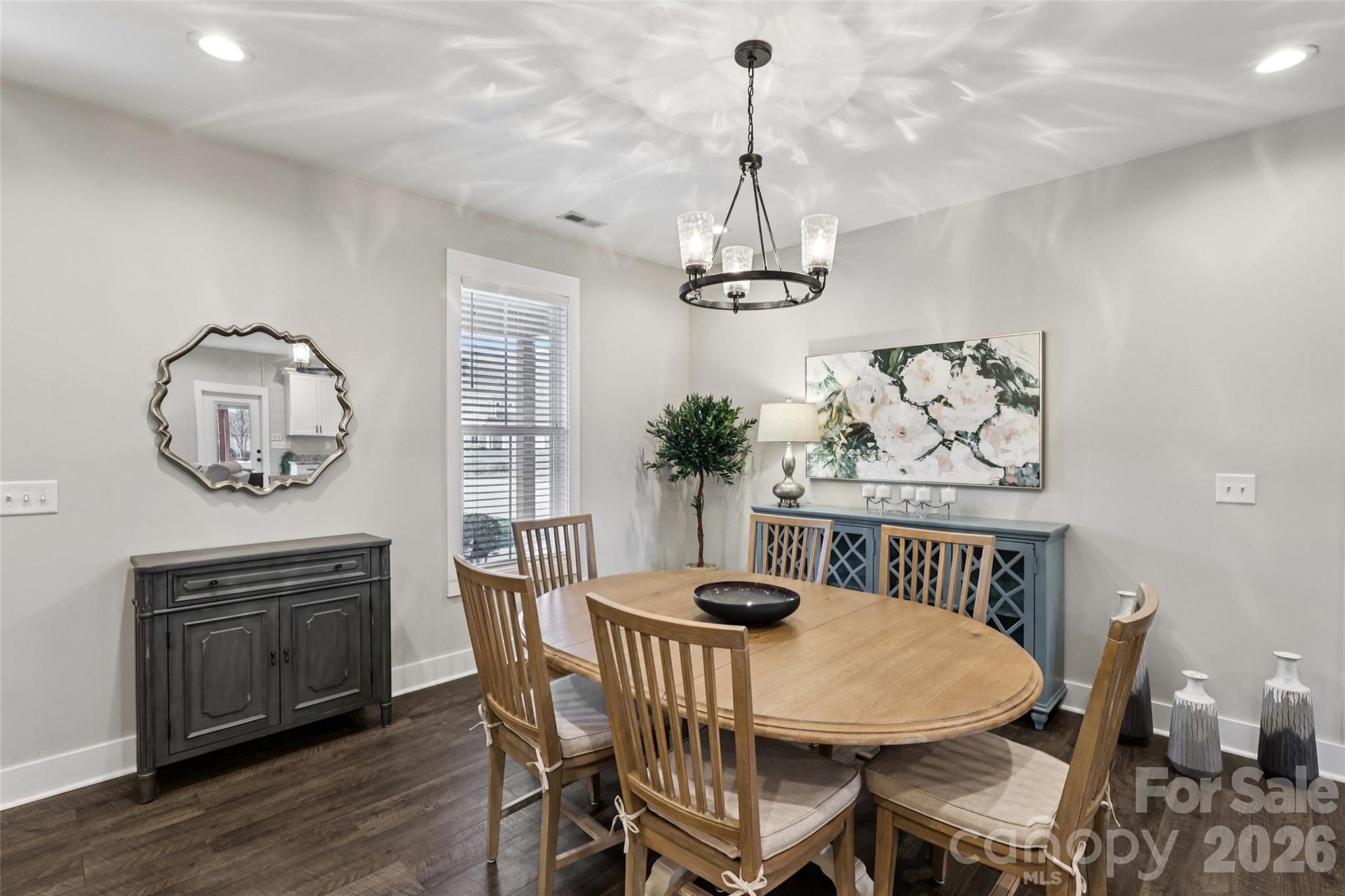 2807 Noritake Trail Albemarle, NC 28001 - Photo 7 of 45 a view of a dining room with furniture wooden floor and chandelier