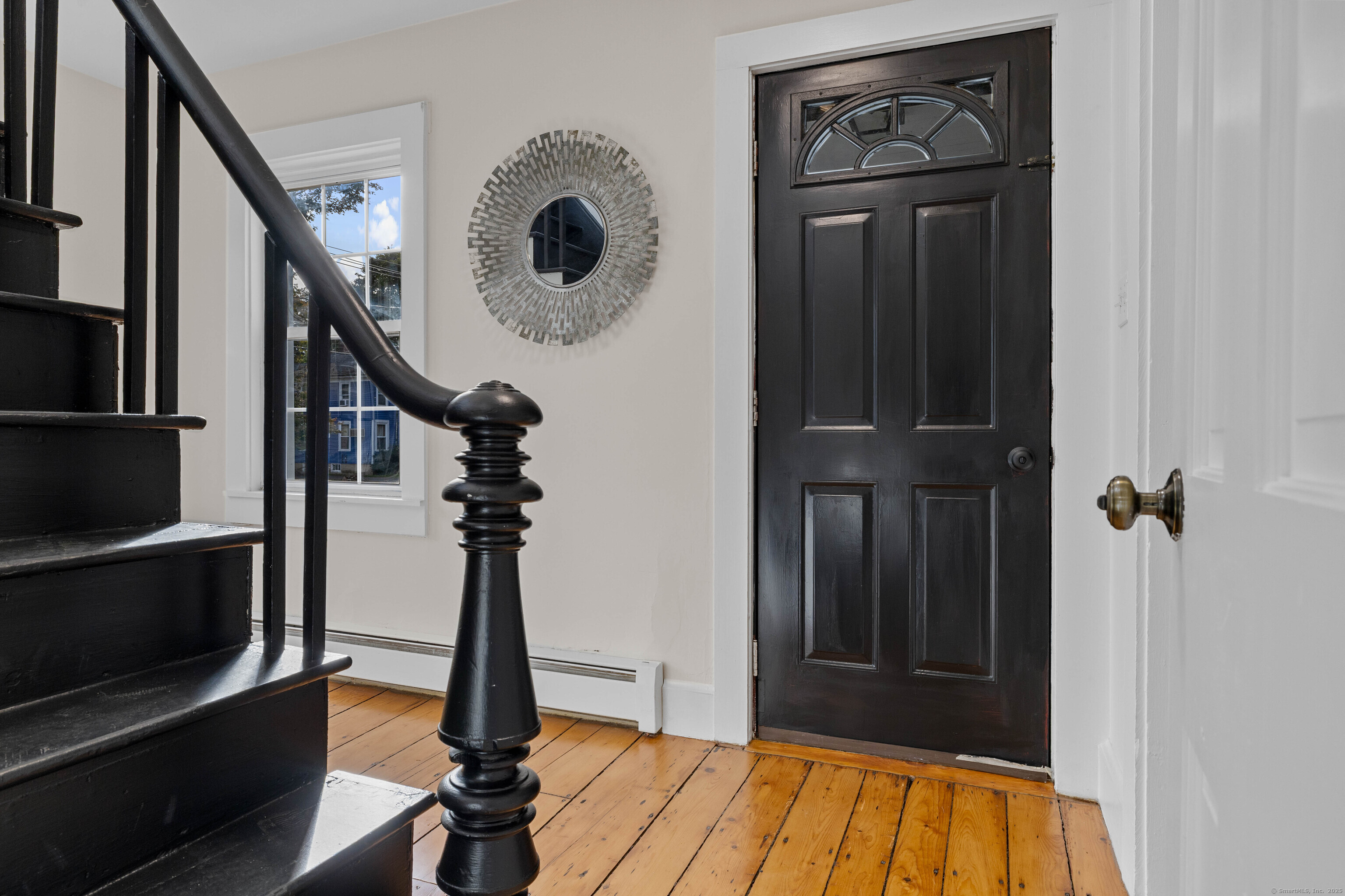 82 State Street Guilford, CT 06437 - Photo 2 of 40 a view of entryway with wooden floor