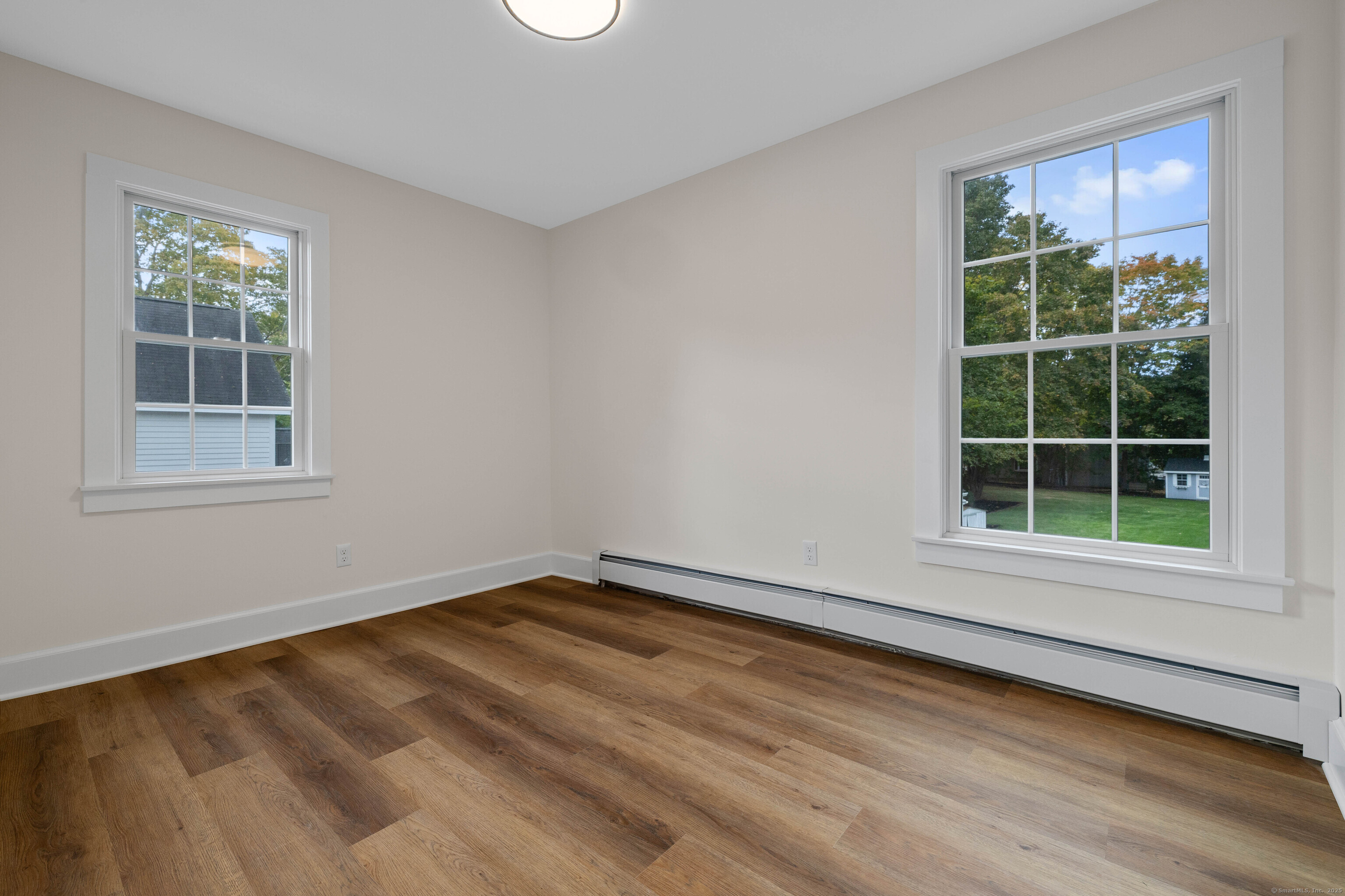 82 State Street Guilford, CT 06437 - Photo 26 of 40 a view of an empty room with a window