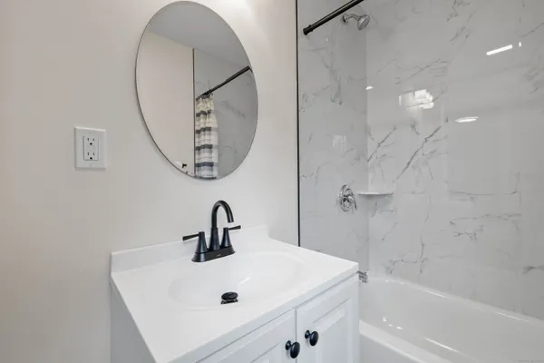 a view of a deck with a table and chairs