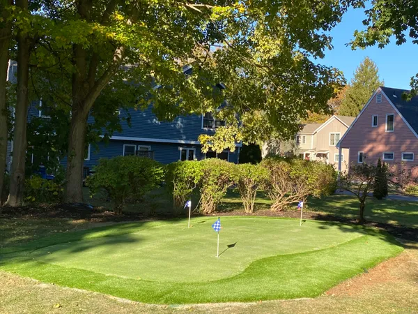 a garden view with a seating space