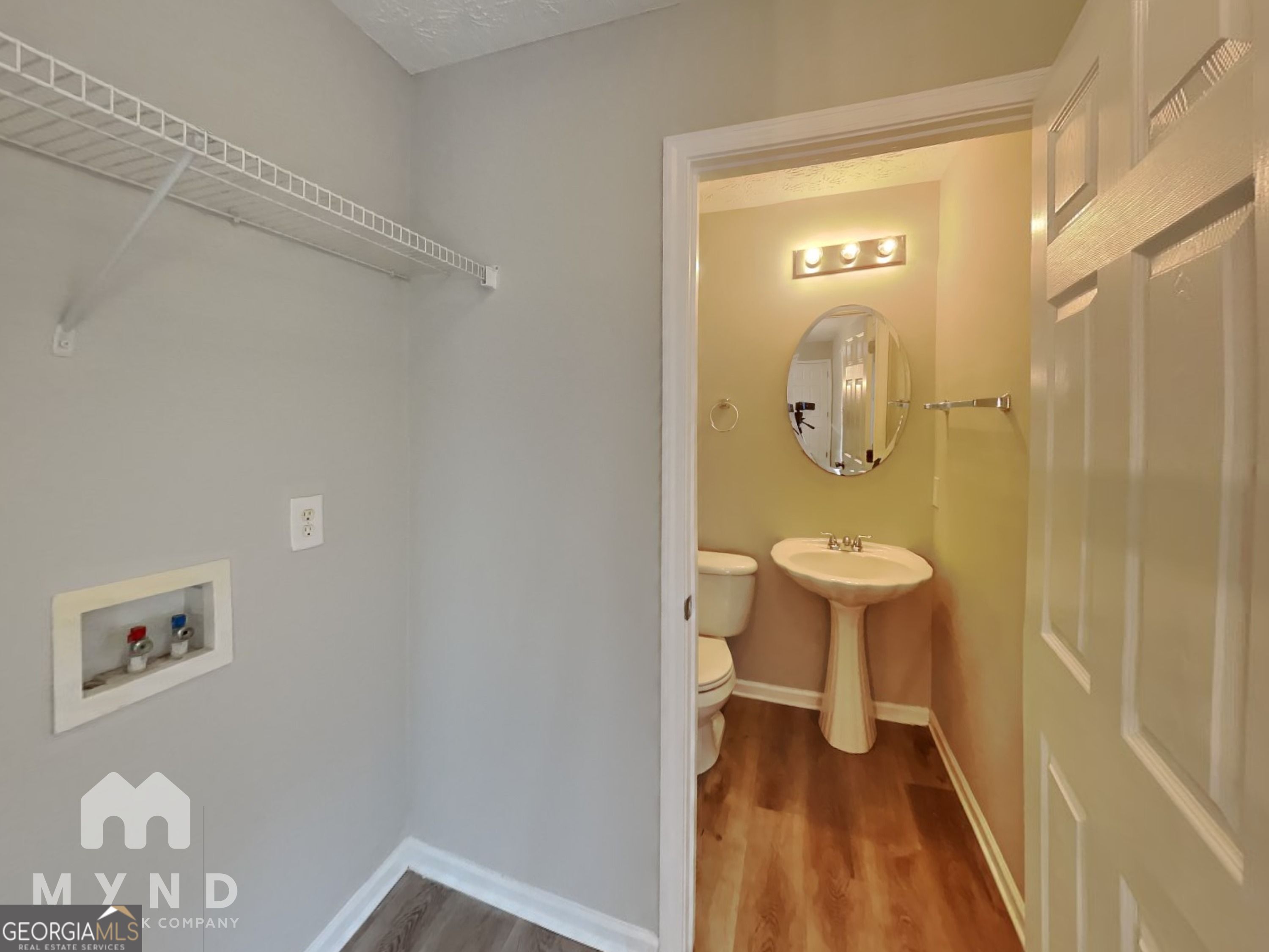 3828 Leyland Drive Decatur, GA 30034 - Photo 20 of 26 a bathroom with a sink and a mirror
