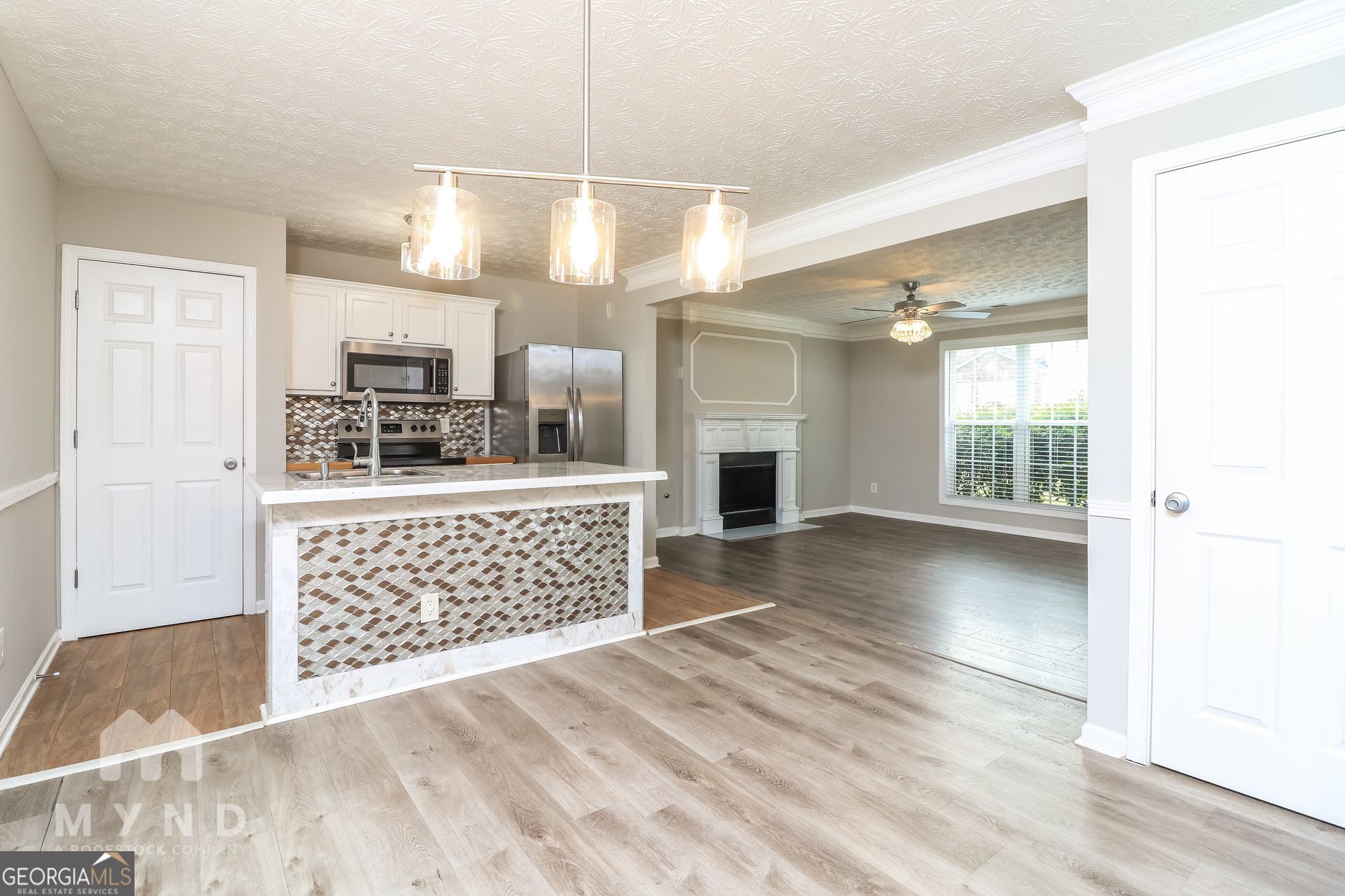 3828 Leyland Drive Decatur, GA 30034 - Photo 9 of 26 a view of kitchen with sink microwave and refrigerator