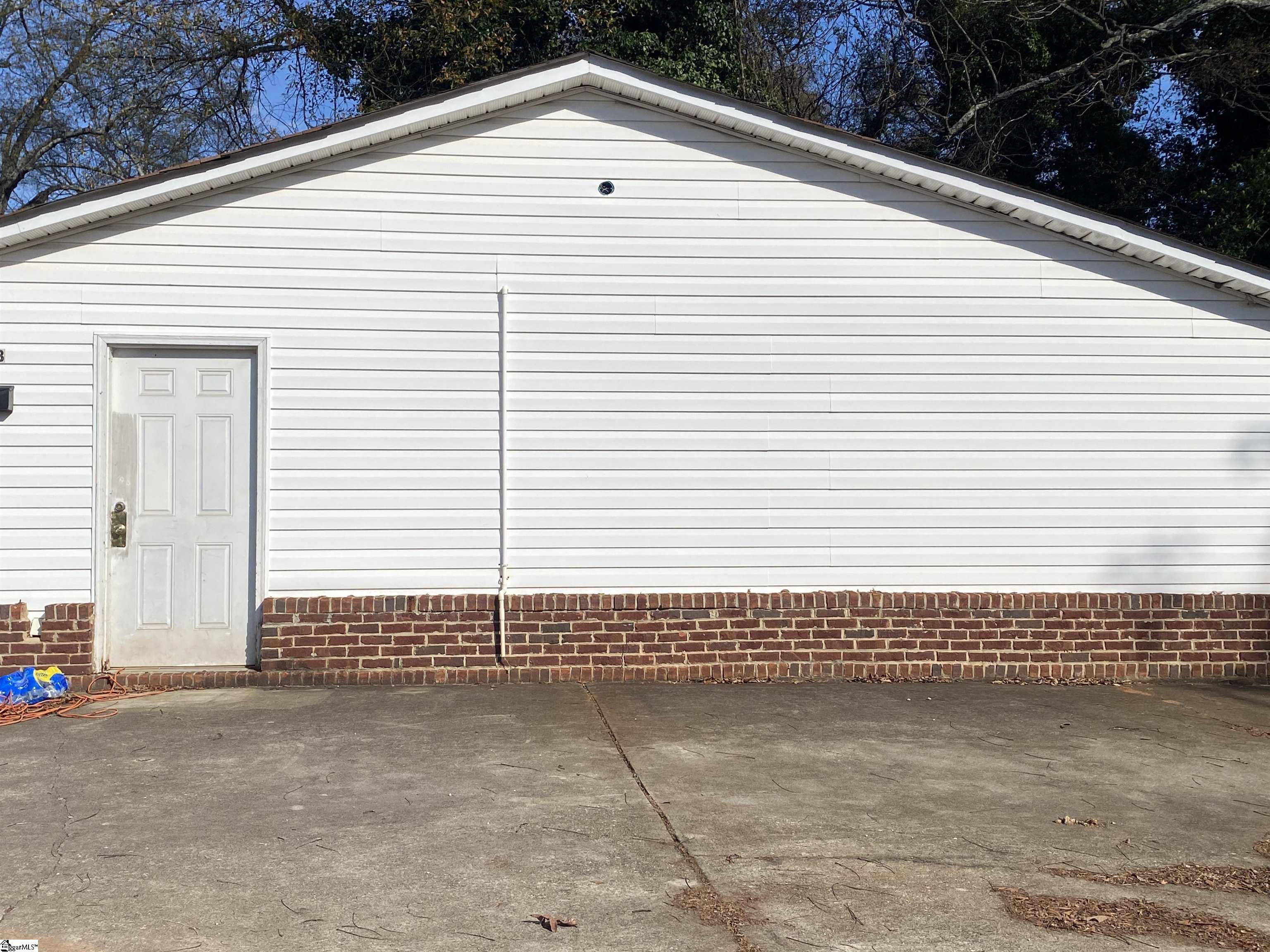 409 Easley Bridge Road Greenville, SC 29611 - Photo 19 of 28 The Supra lockbox is located on the door of this building.