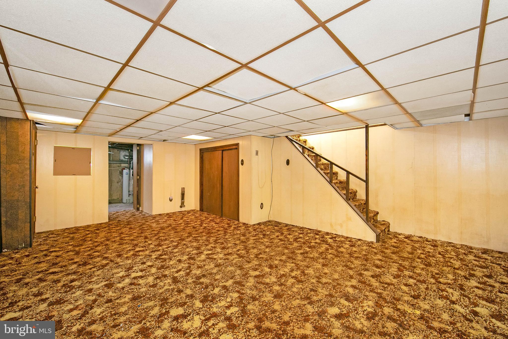 681 Dutton Circle Springfield, PA 19064 - Photo 32 of 45 a view of a big room with a bed and wooden floor