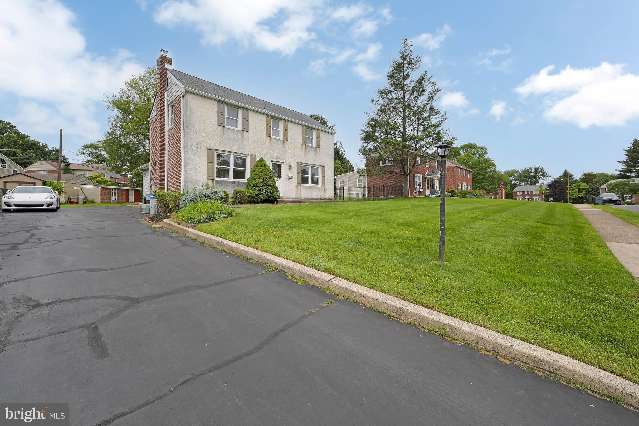 681 Dutton Circle Springfield, PA 19064 - Photo 36 of 45 a view of a house with backyard and trees