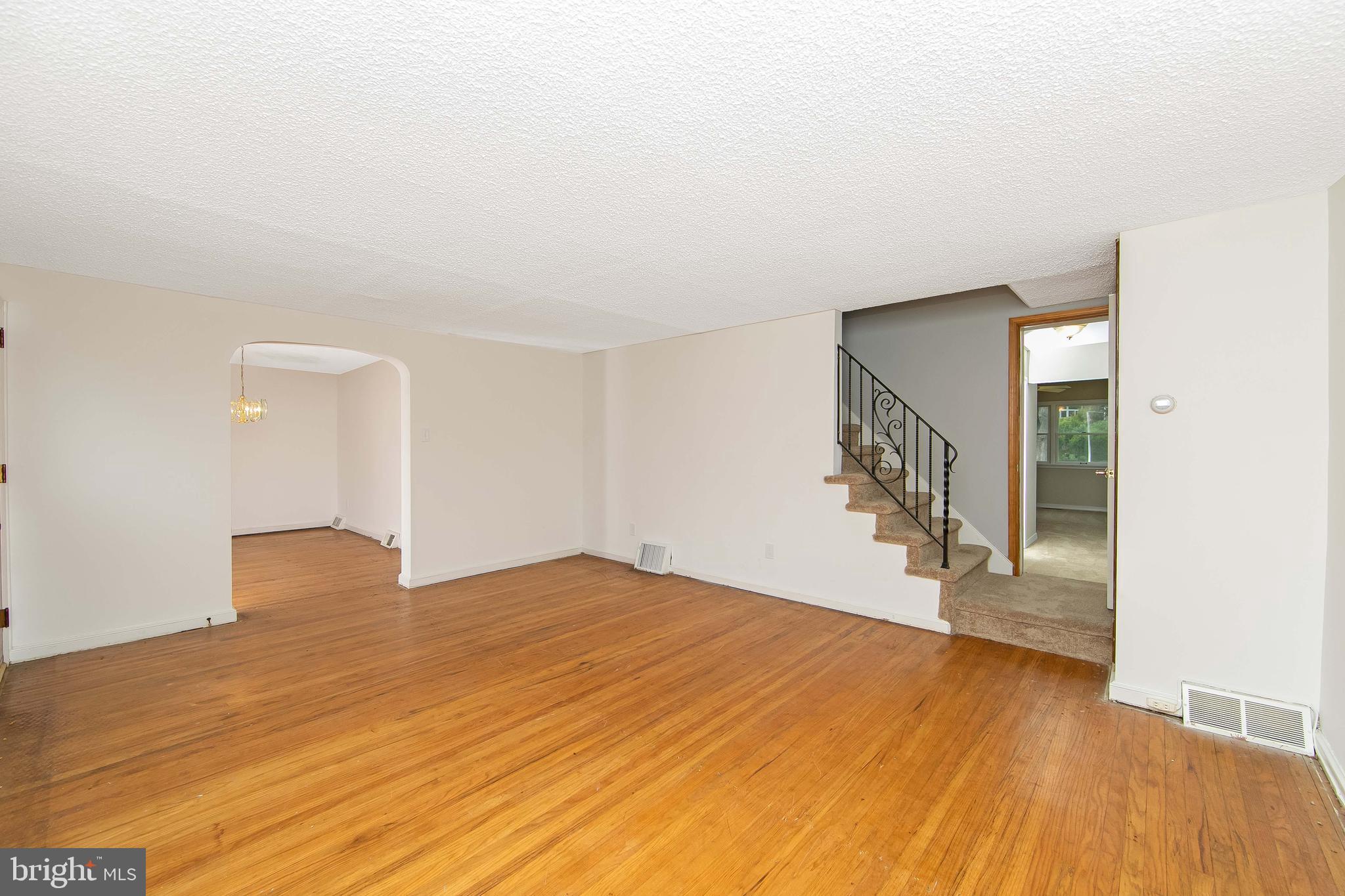 681 Dutton Circle Springfield, PA 19064 - Photo 8 of 45 a view of an empty room with wooden floor