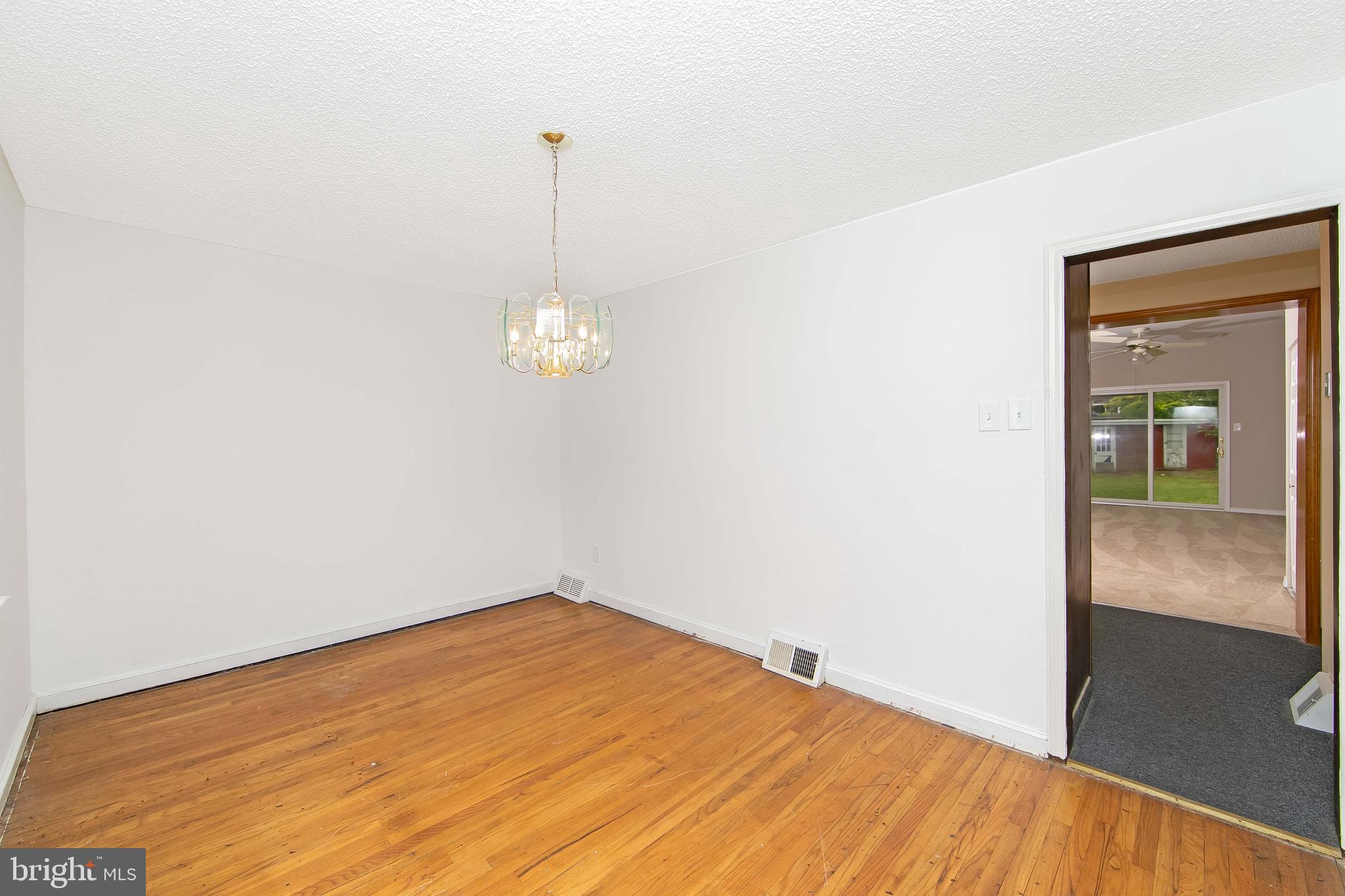 681 Dutton Circle Springfield, PA 19064 - Photo 9 of 45 a view of empty room with wooden floor