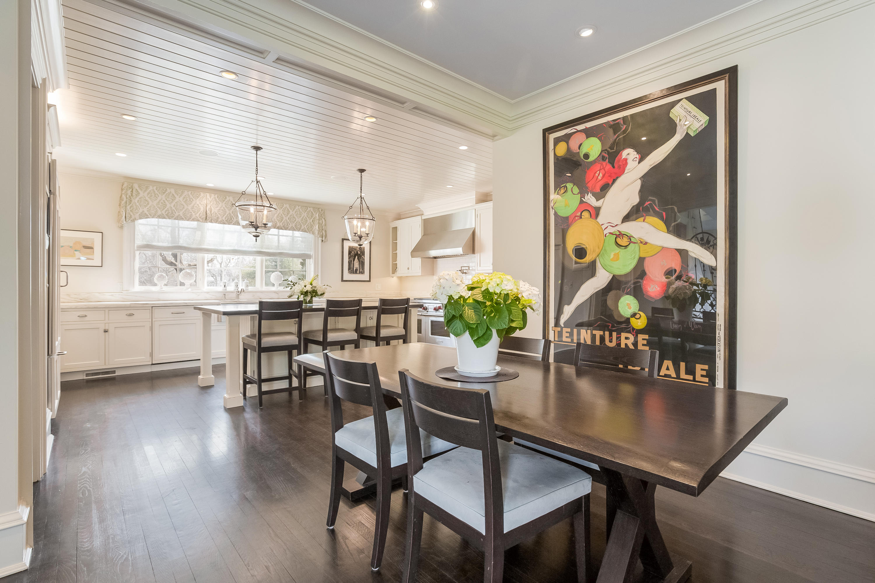 6 Davis Lane Darien, CT 06820 - Photo 17 of 49 a view of a dining room with furniture one side kitchen view and wooden floor