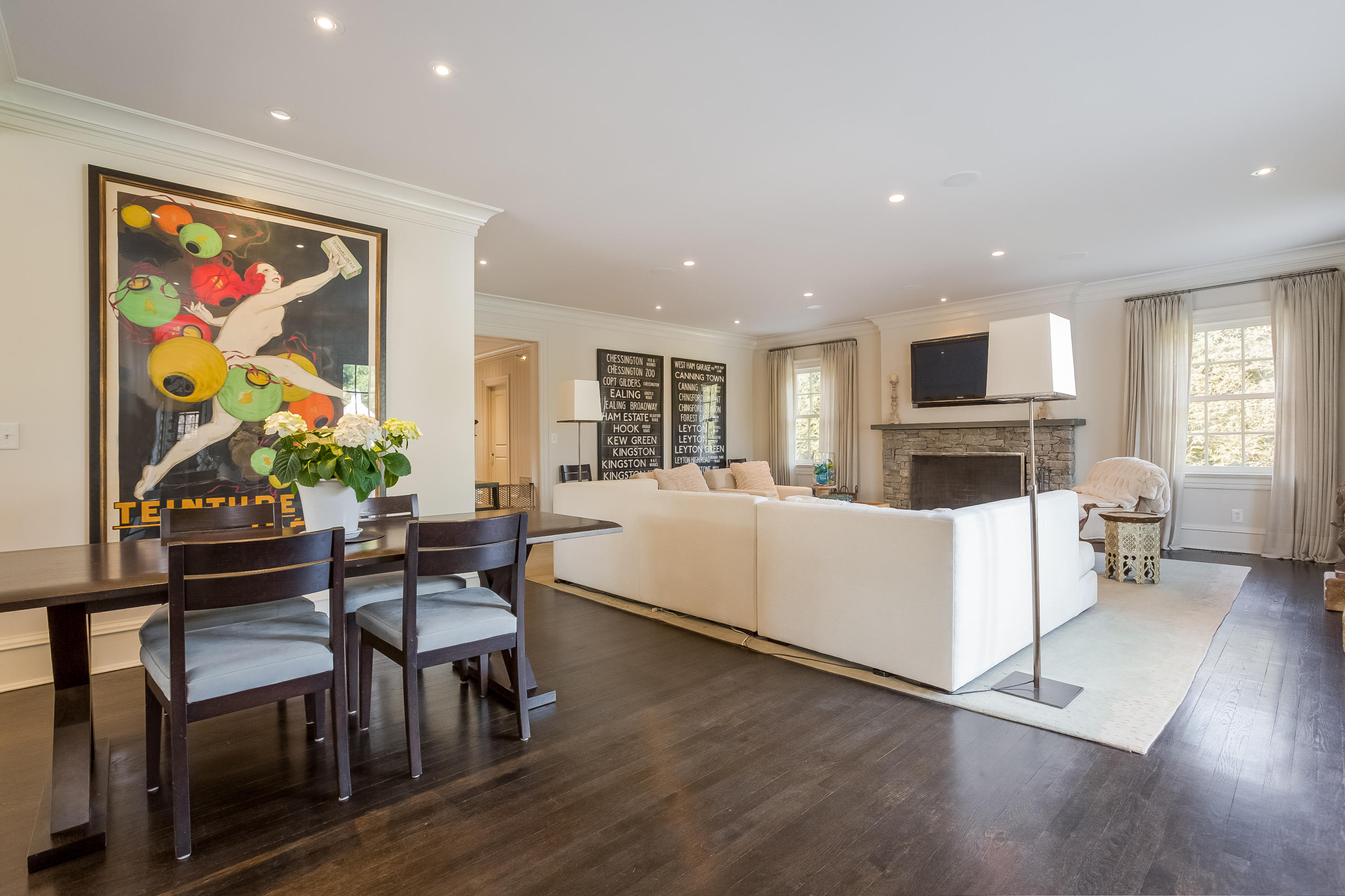 6 Davis Lane Darien, CT 06820 - Photo 18 of 49 a living room with furniture a flat screen tv and kitchen view