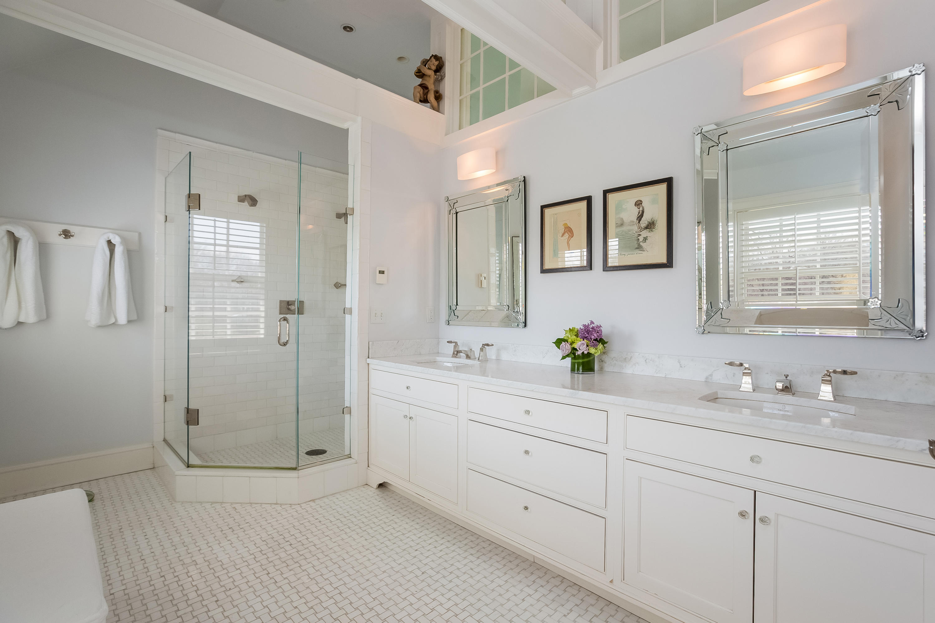 6 Davis Lane Darien, CT 06820 - Photo 25 of 49 a bathroom with a double vanity sink mirror and shower