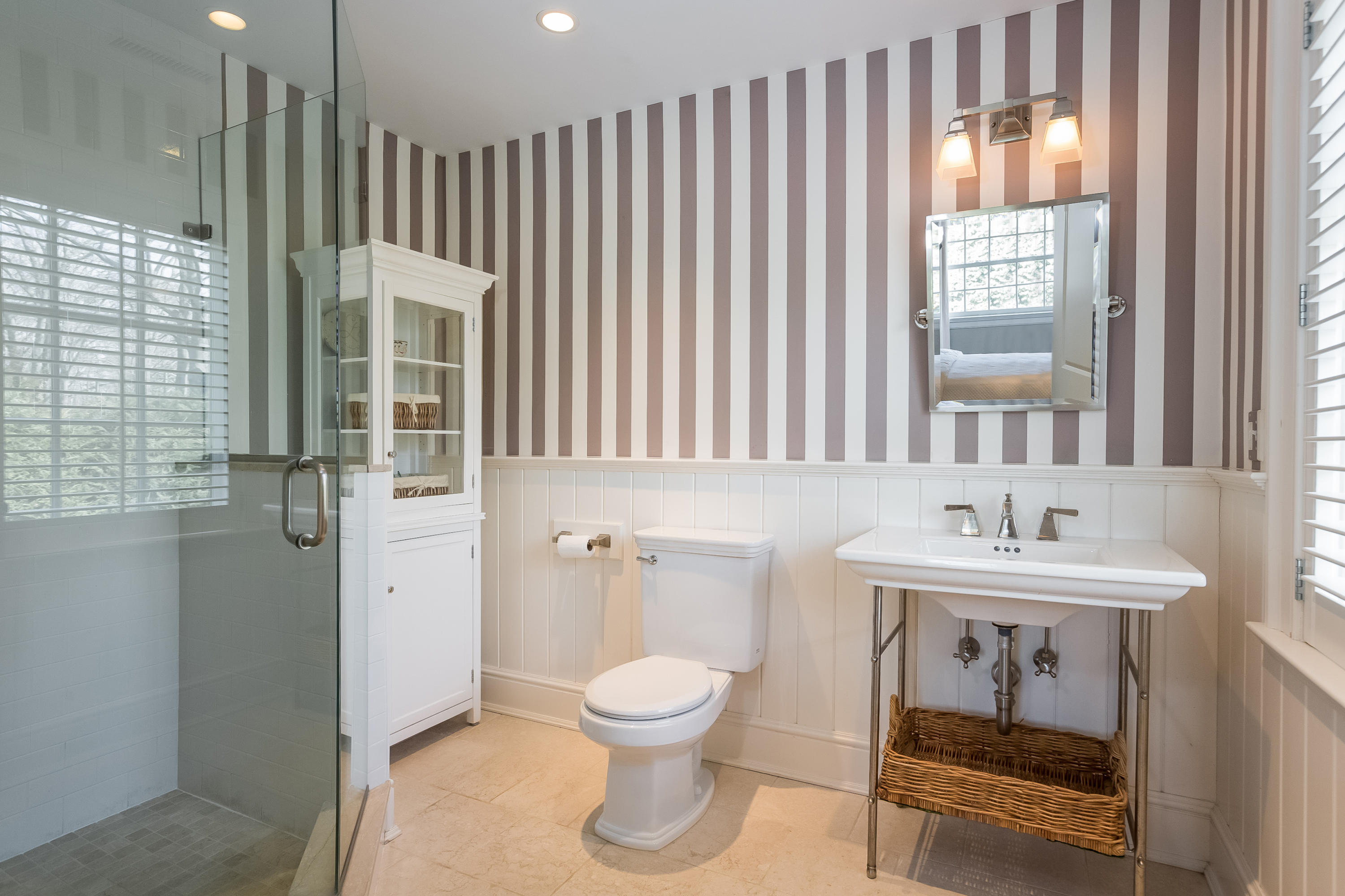 6 Davis Lane Darien, CT 06820 - Photo 28 of 49 a bathroom with a toilet a sink and a window