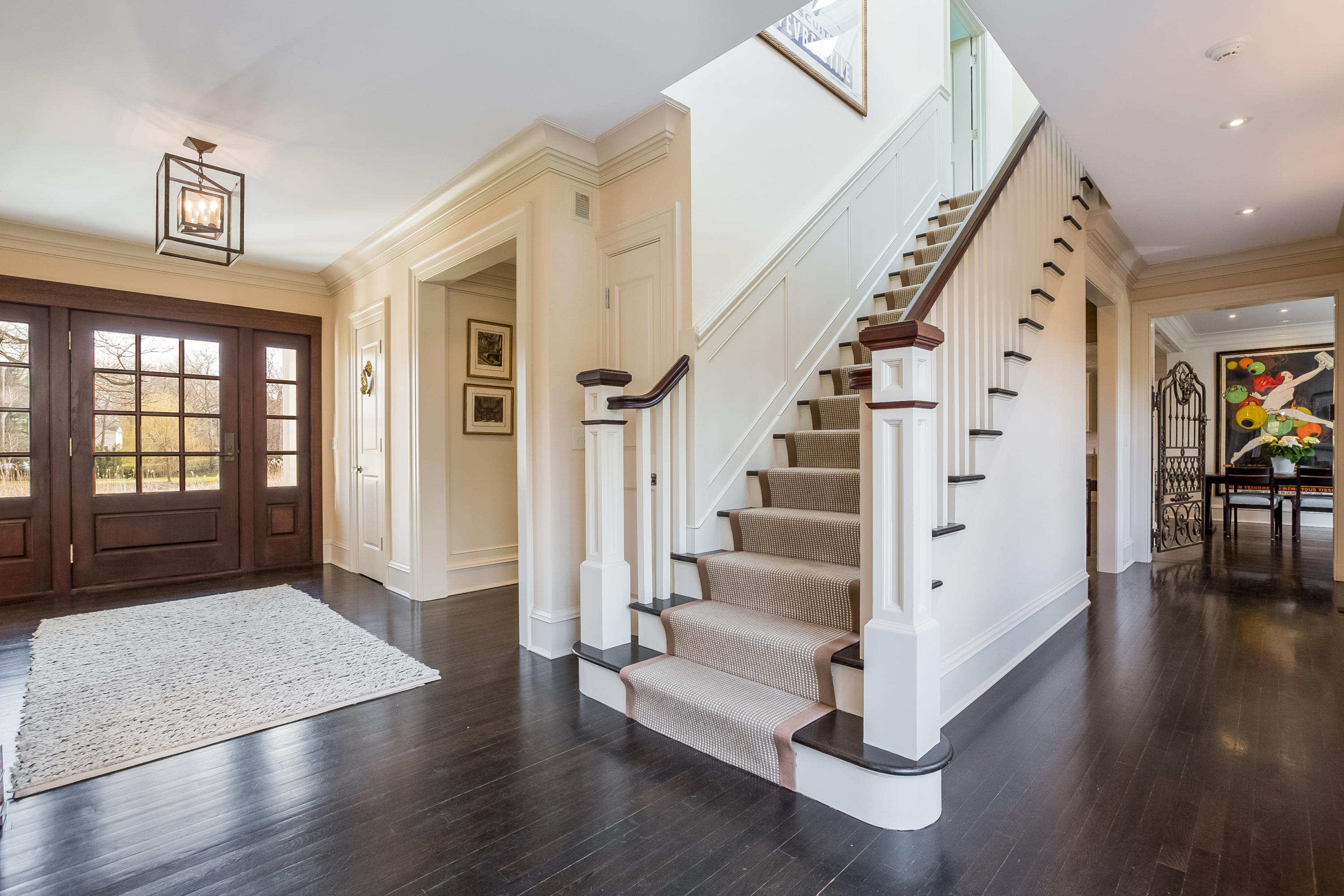 6 Davis Lane Darien, CT 06820 - Photo 6 of 49 a view of entryway with wooden floor and stairs