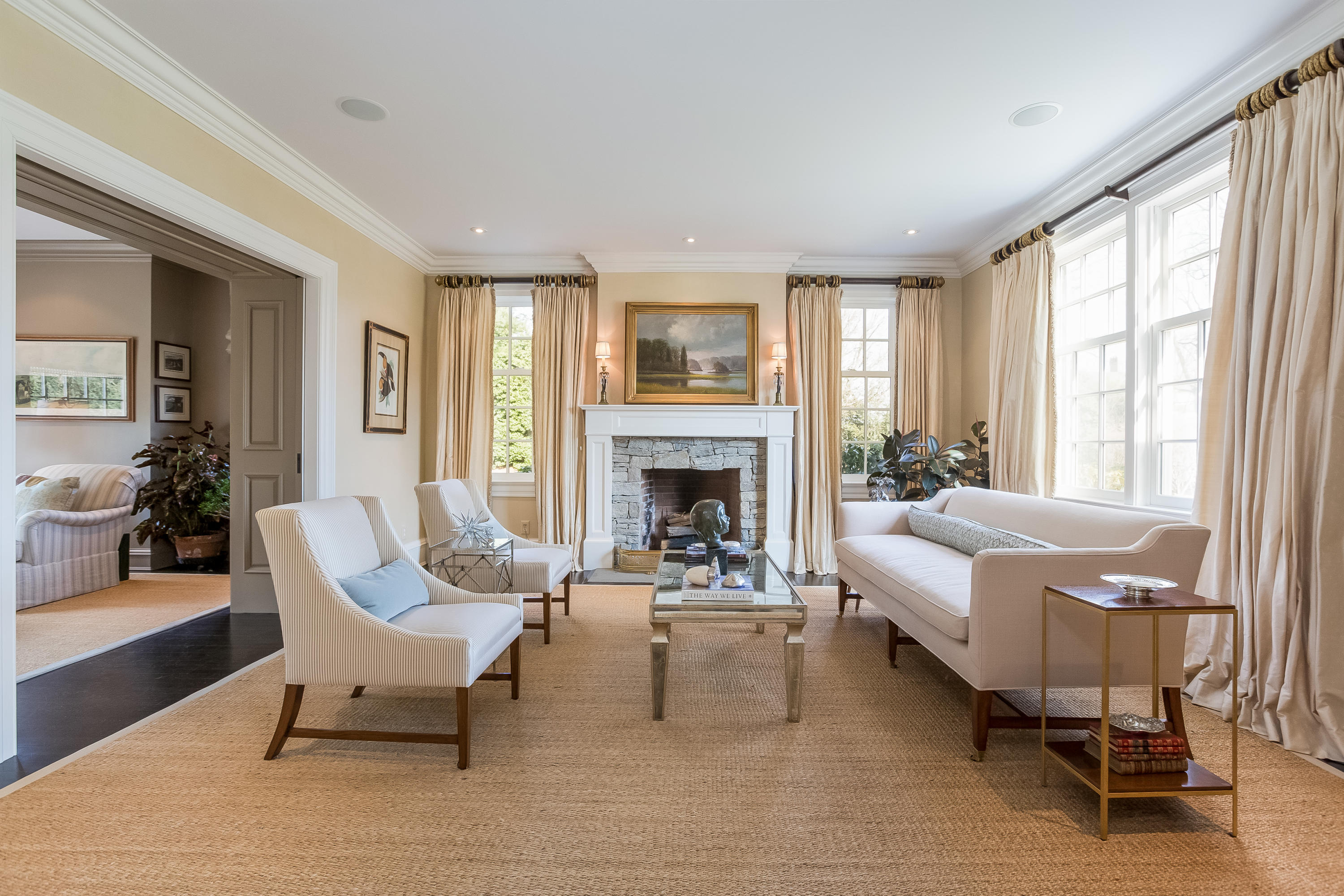 6 Davis Lane Darien, CT 06820 - Photo 7 of 49 a living room with furniture and a fireplace
