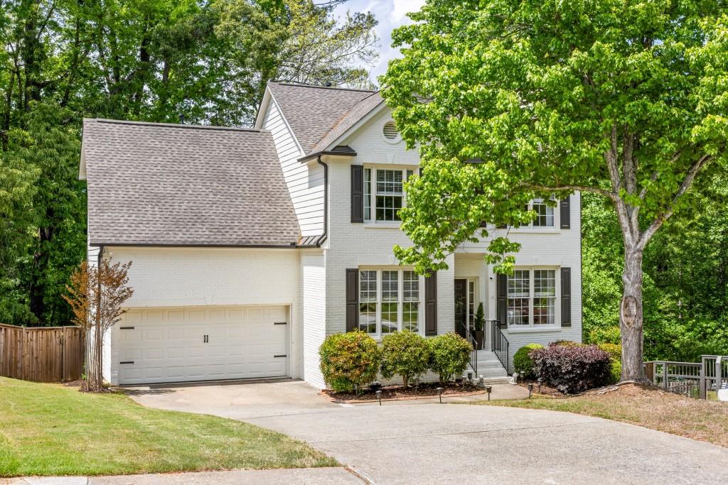6000 Hampton Bluff Way Roswell, GA 30075 - Photo 1 of 1 front view of a house with a yard