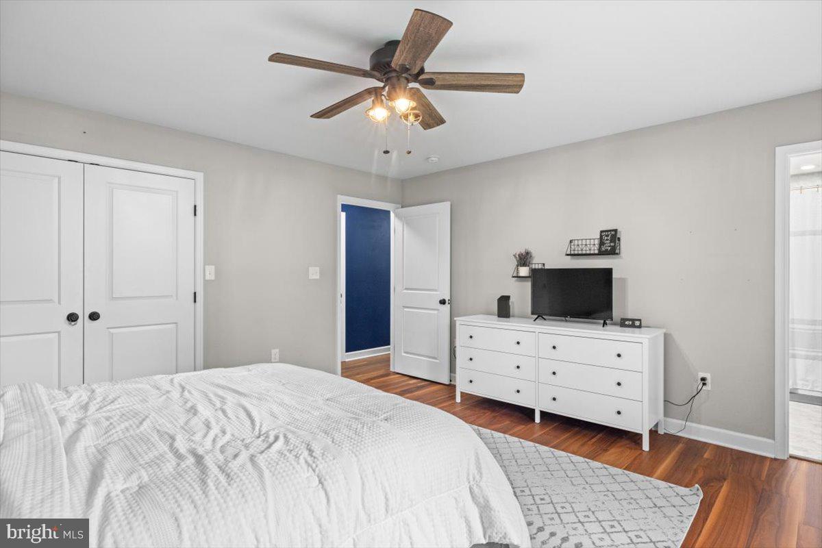 106 Split Rail Road Front Royal, VA 22630 - Photo 15 of 35 a bedroom with a bed and a flat screen tv