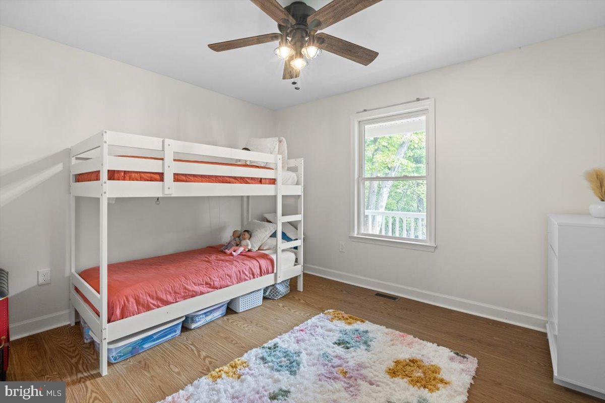 106 Split Rail Road Front Royal, VA 22630 - Photo 17 of 35 a bedroom with a bed and a window