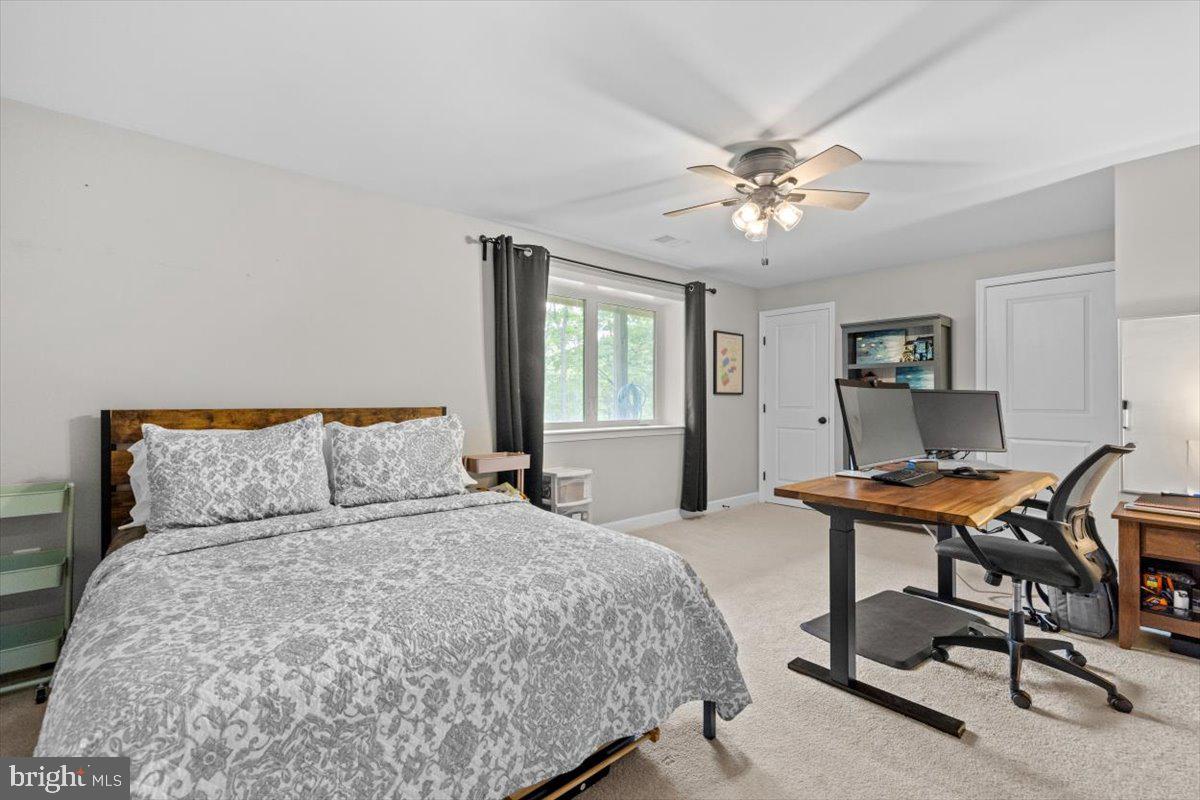 106 Split Rail Road Front Royal, VA 22630 - Photo 23 of 35 a bedroom with a bed and a table in it
