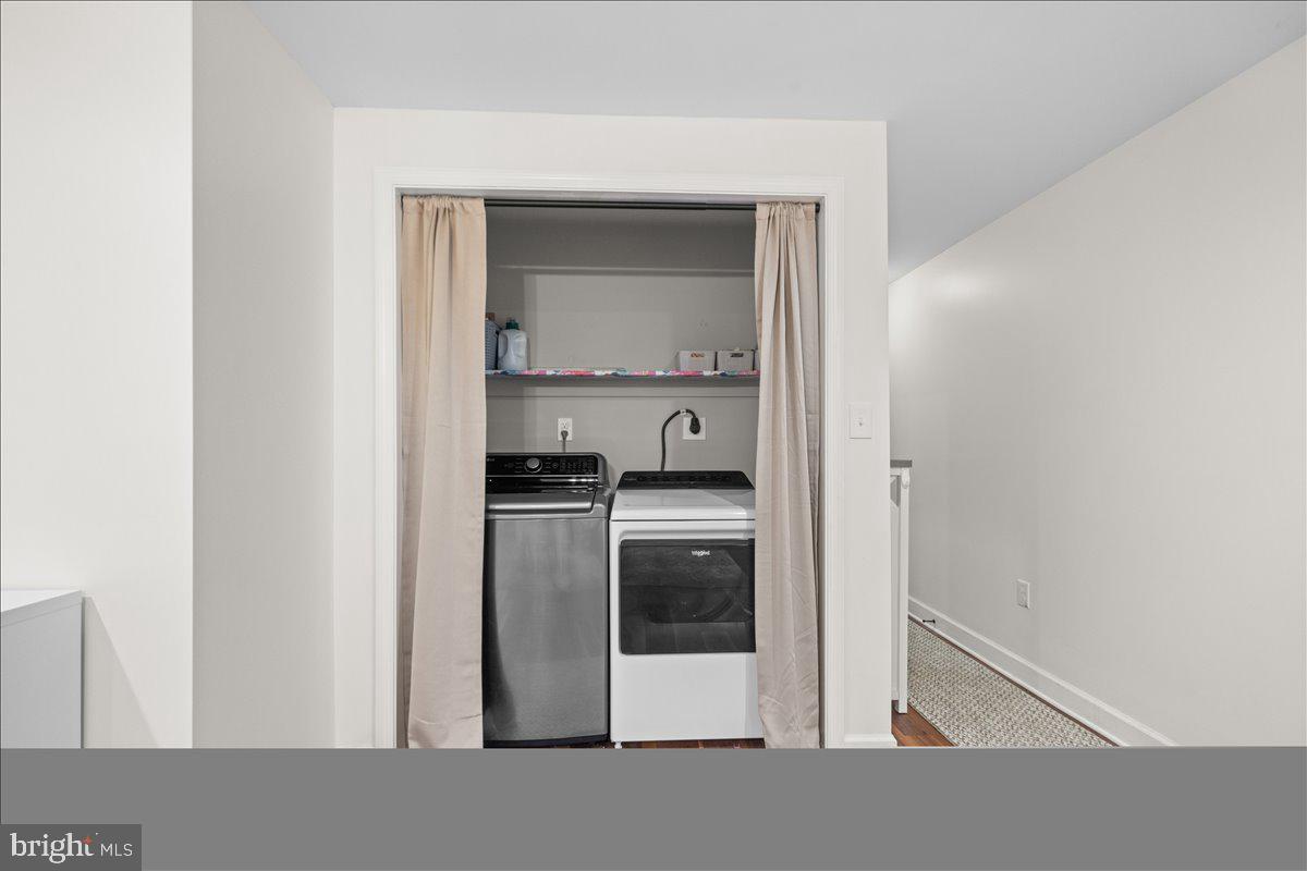106 Split Rail Road Front Royal, VA 22630 - Photo 25 of 35 a kitchen with a refrigerator and cabinets